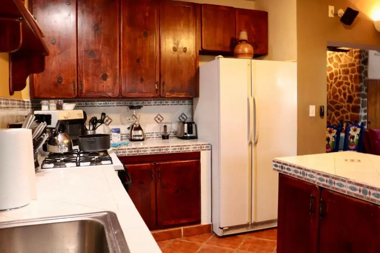 Kitchen/Kitchenette in Sukasa Bungalows