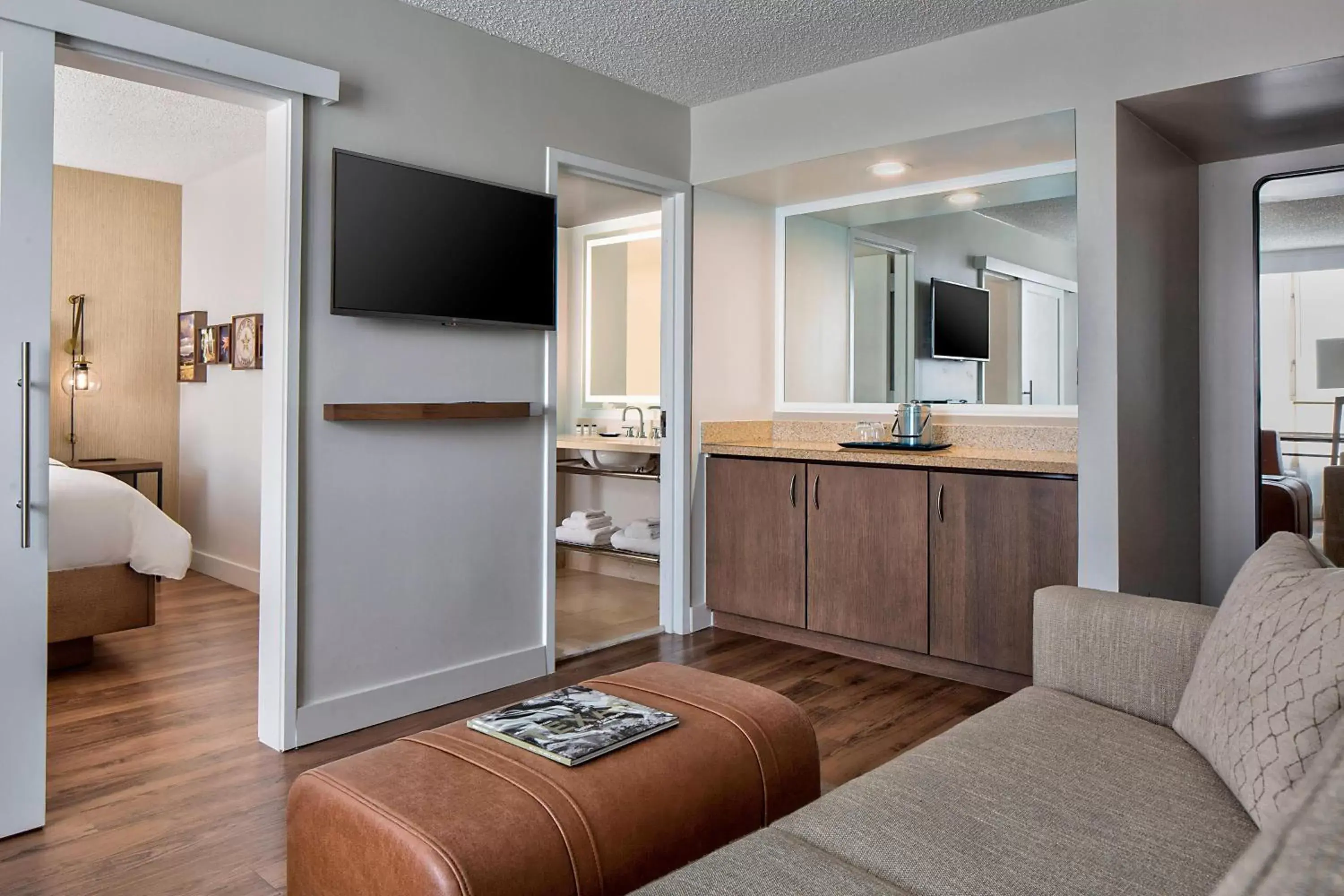 Living room, TV/Entertainment Center in Sheraton Suites Market Center Dallas