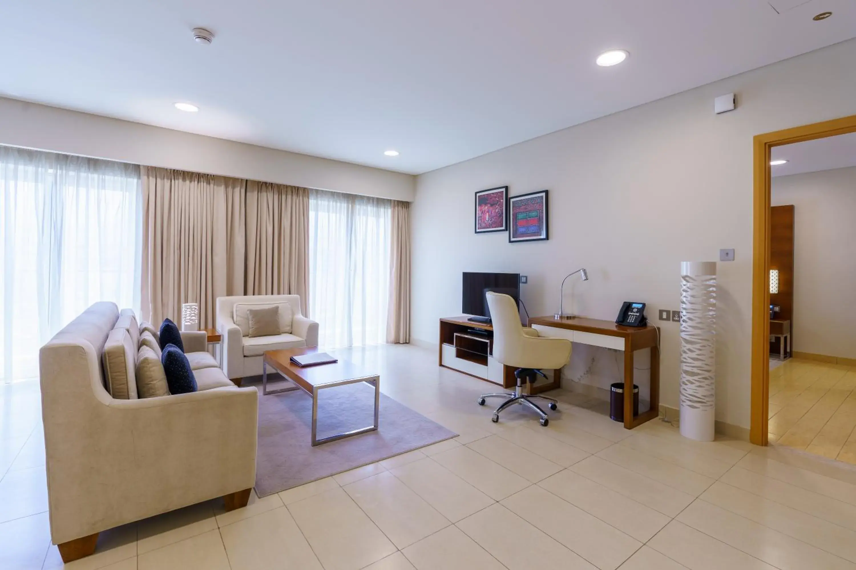 Living room, Seating Area in Levatio Suites Muscat, a member of Radisson Individuals