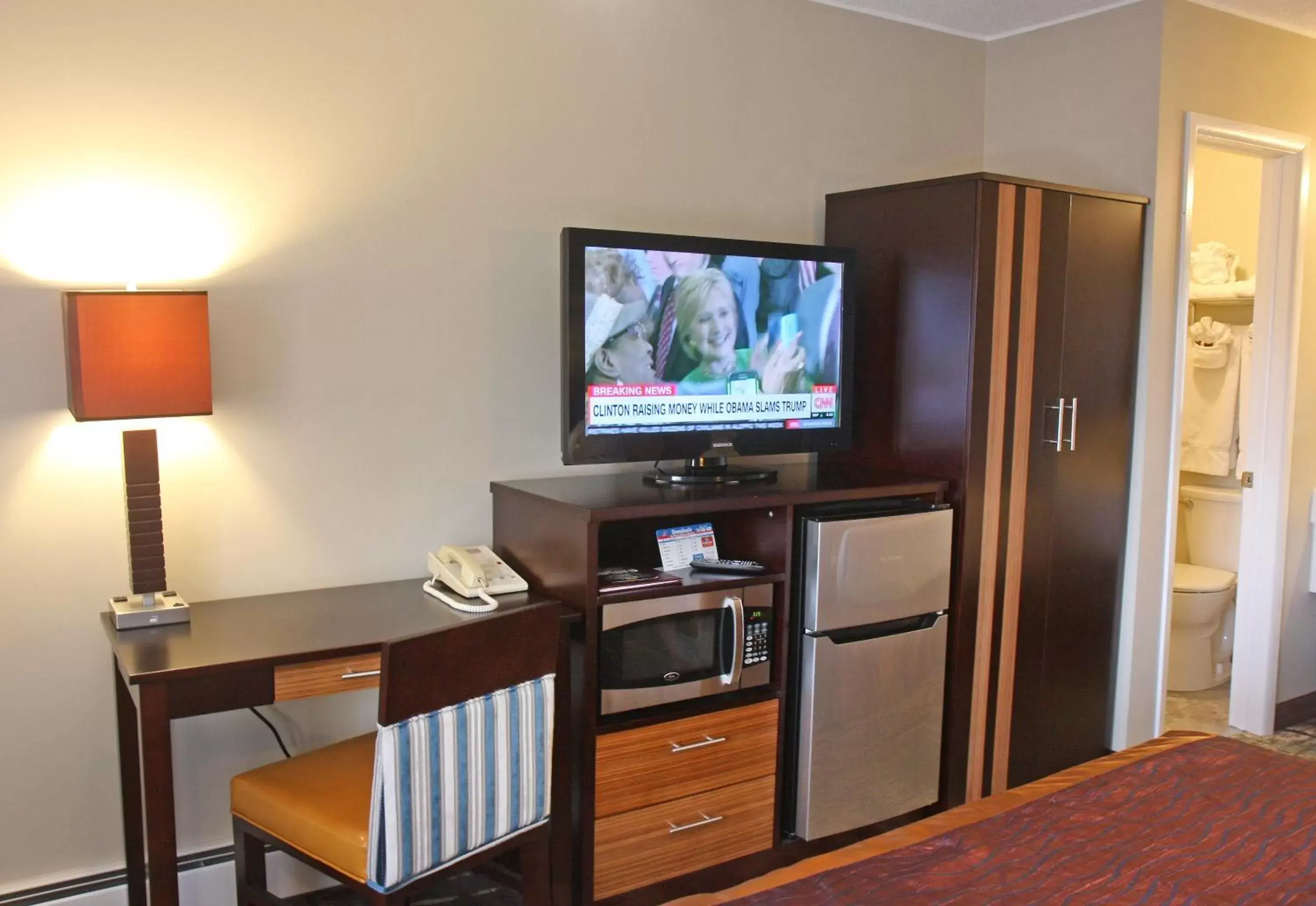 Photo of the whole room, TV/Entertainment Center in Gateway Inn and Suites