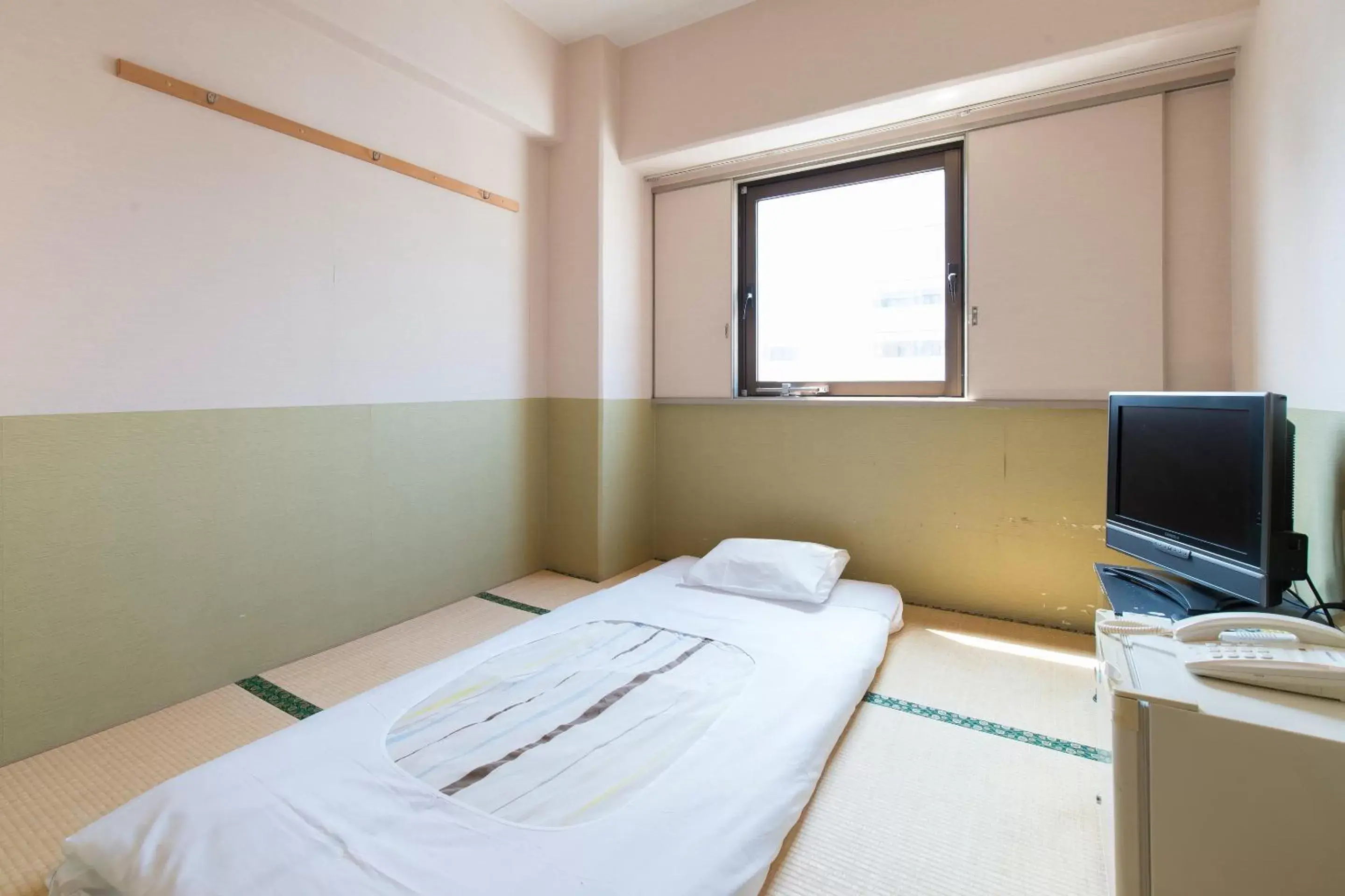 Photo of the whole room, Bed in Tabist Hotel Tetora Kitakyushu