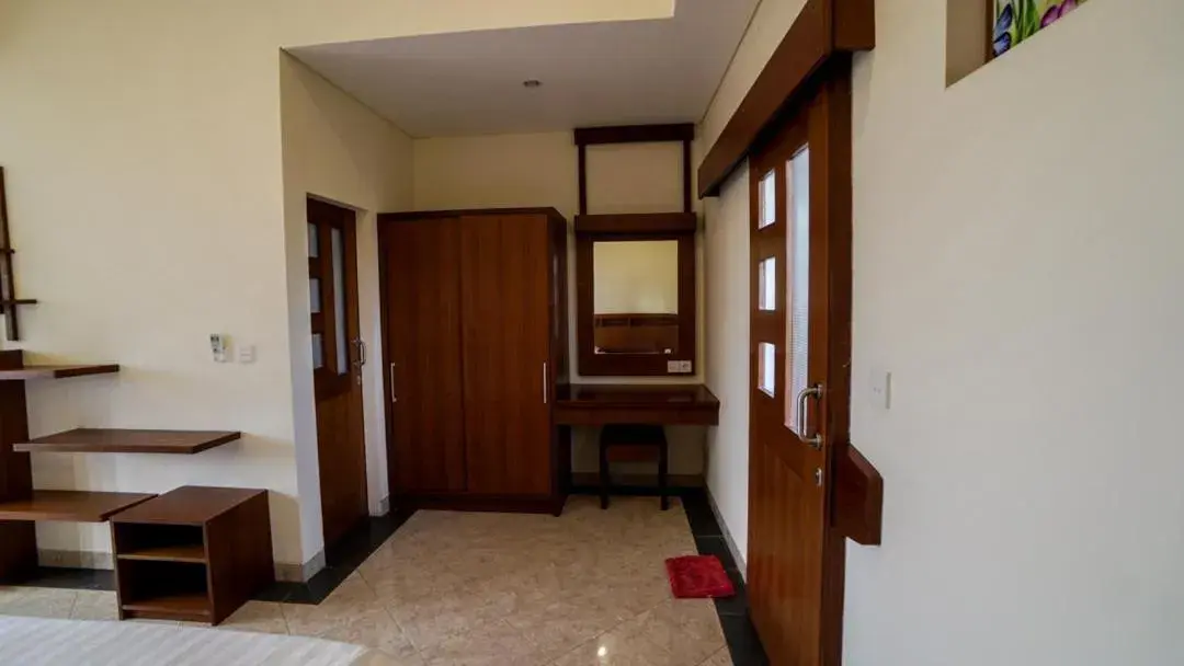 Bedroom, TV/Entertainment Center in The Janan Villa