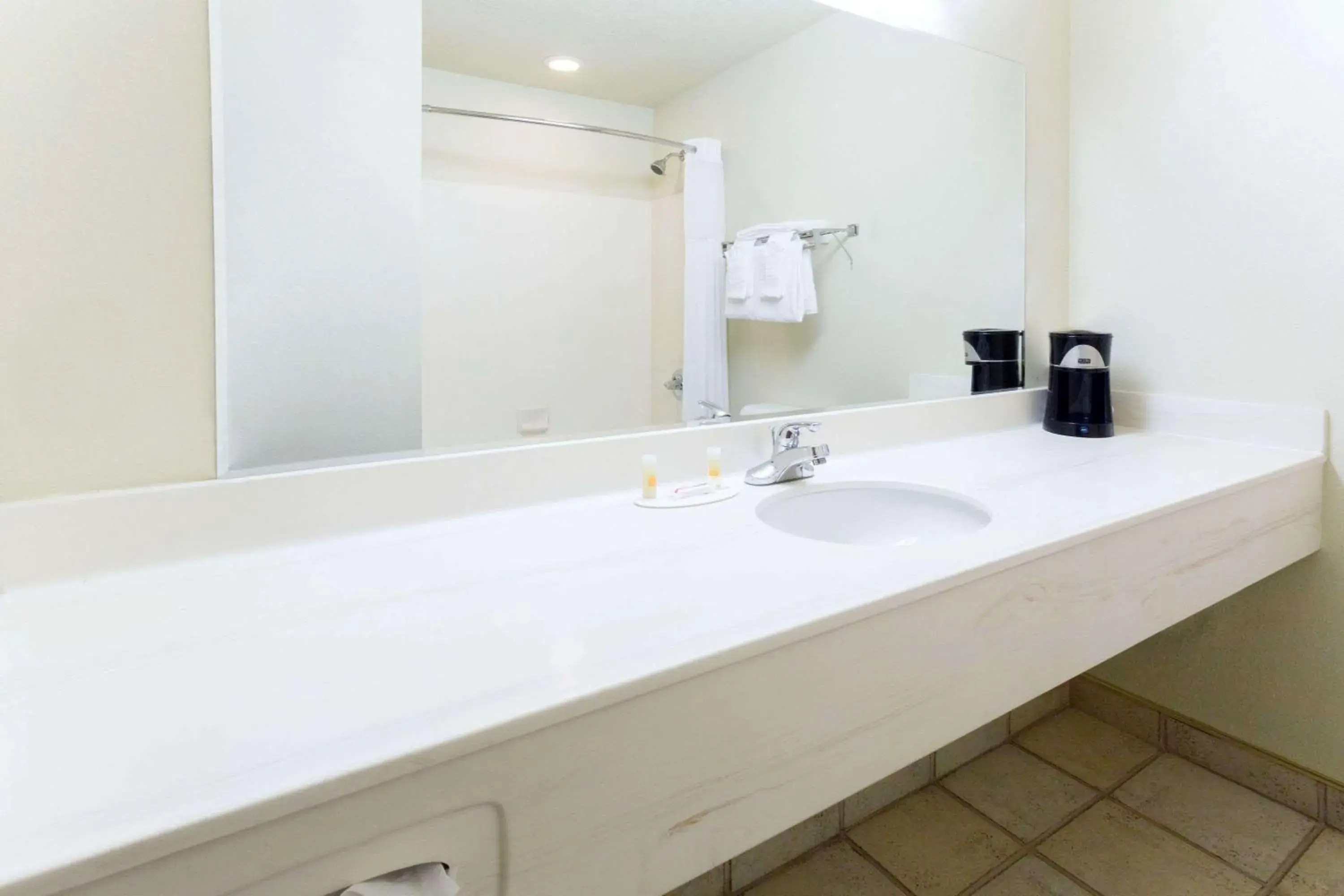 Bathroom in Days Inn by Wyndham Colorado Springs Airport