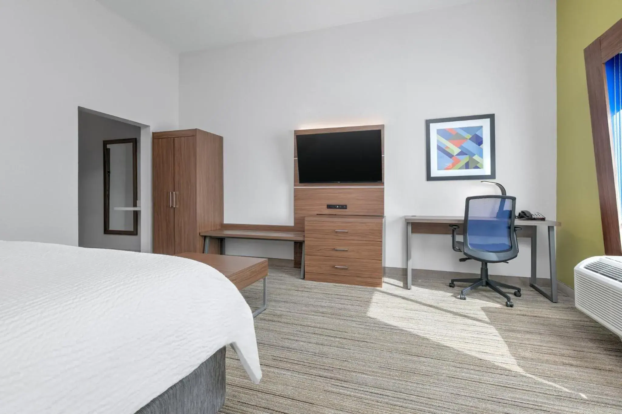 Photo of the whole room, TV/Entertainment Center in Holiday Inn Express - San Antonio East I-10 , an IHG Hotel