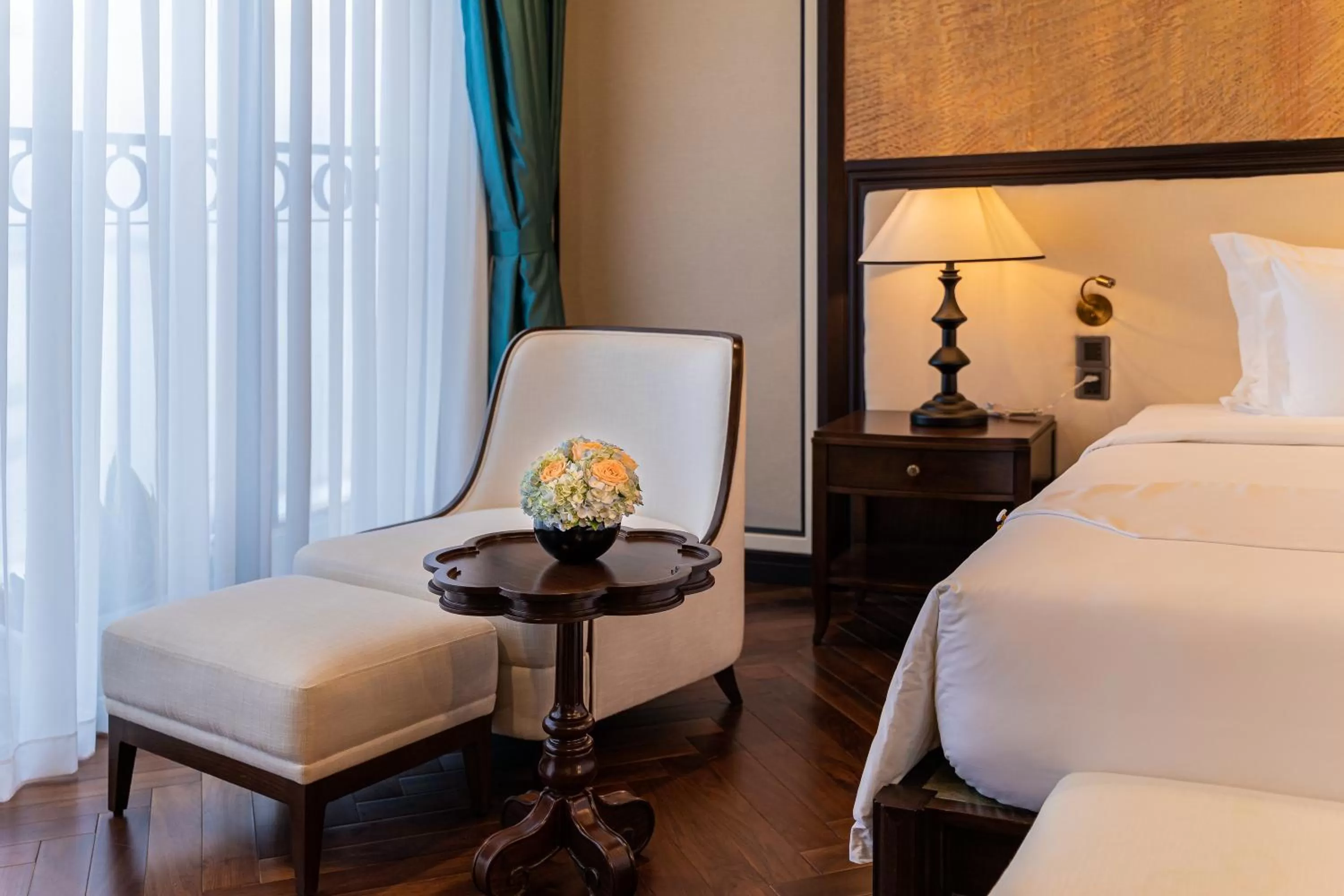 Seating area, Bed in Potique Hotel