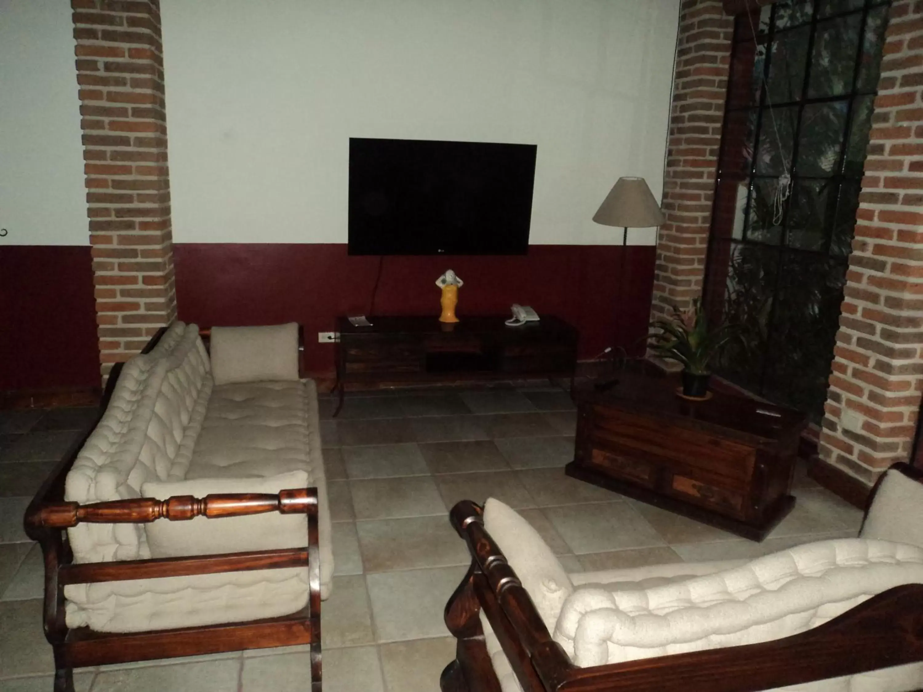 Communal lounge/ TV room, Seating Area in Hotel Boutique Casabella