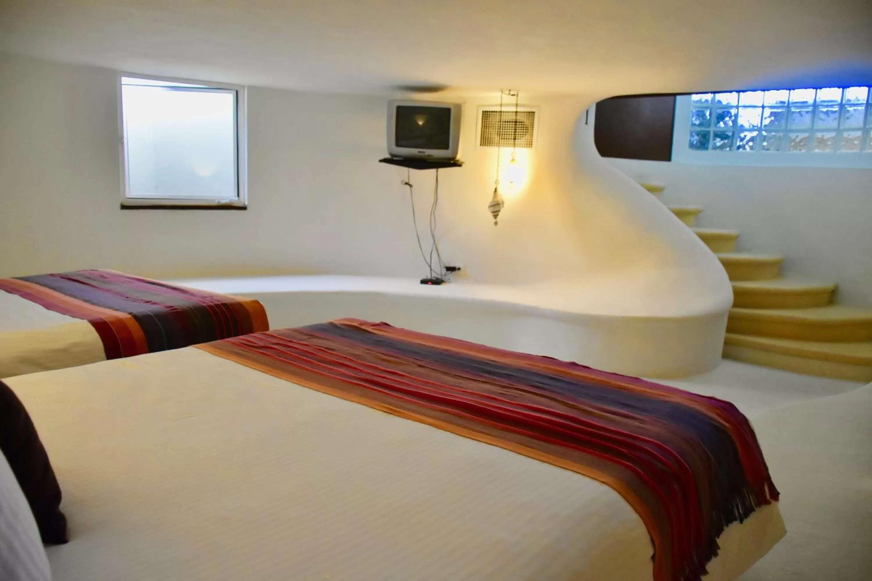 Bed in Playa Palms Beach Hotel