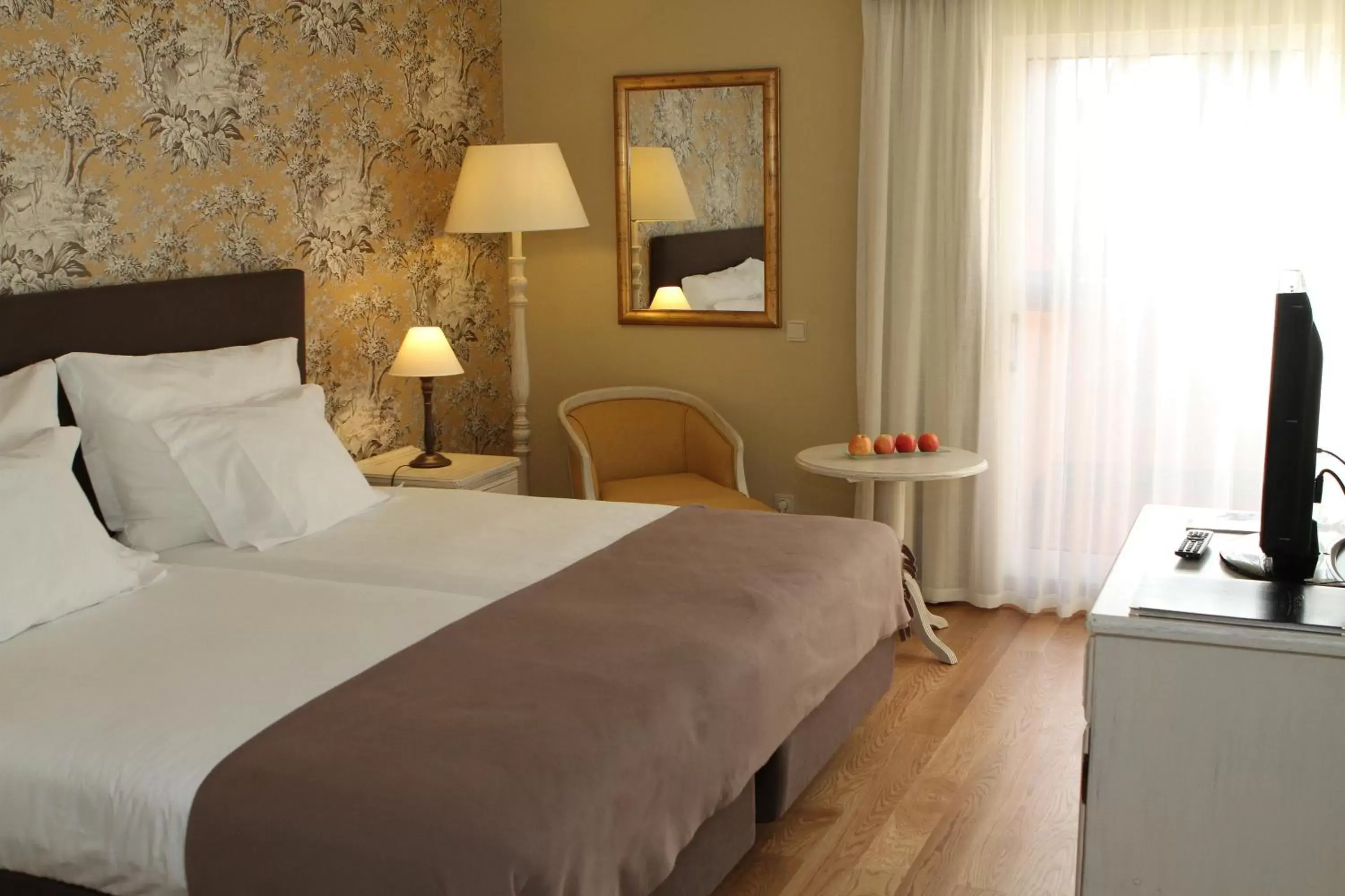 Photo of the whole room, Bed in Pestana Village Garden Hotel