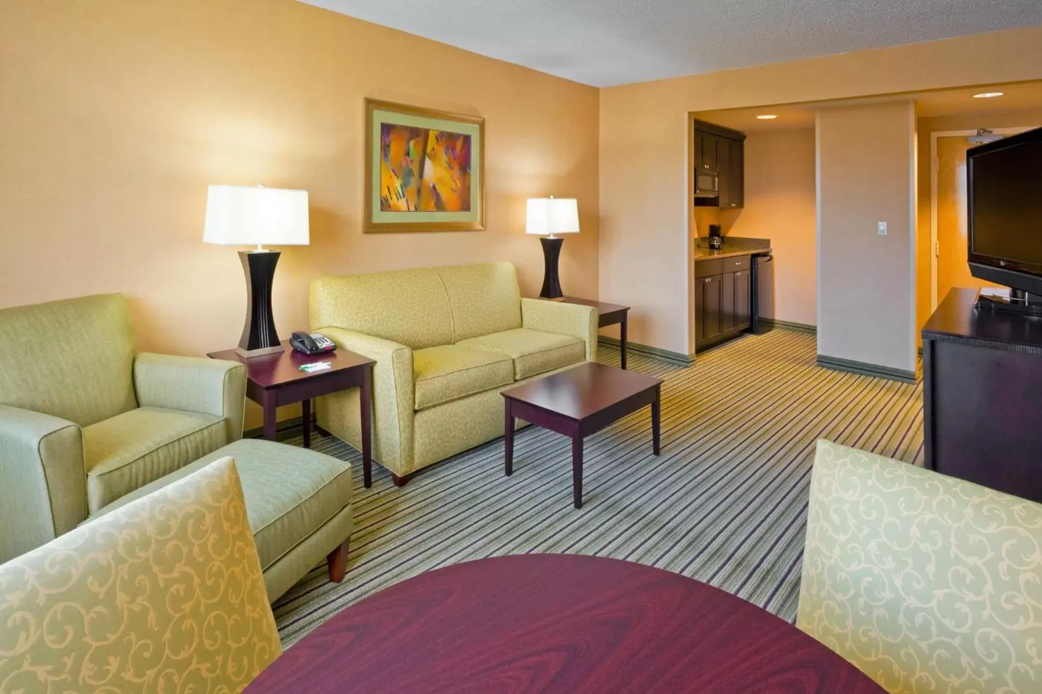 Bedroom, Seating Area in Holiday Inn & Suites Parsippany Fairfield, an IHG Hotel