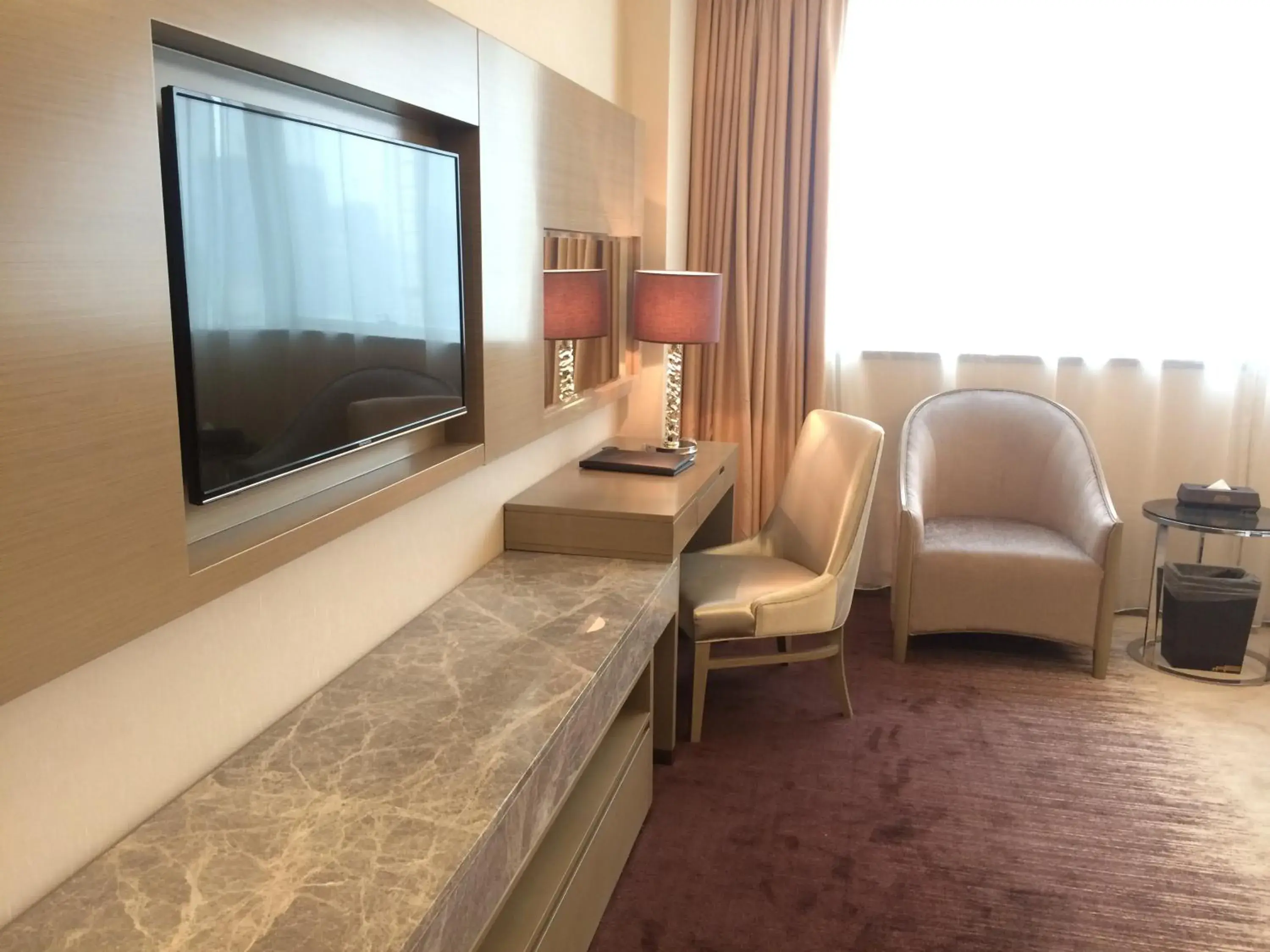 Living room, TV/Entertainment Center in Shenzhen Baoan PLUS Gems Cube Hotel                                                             