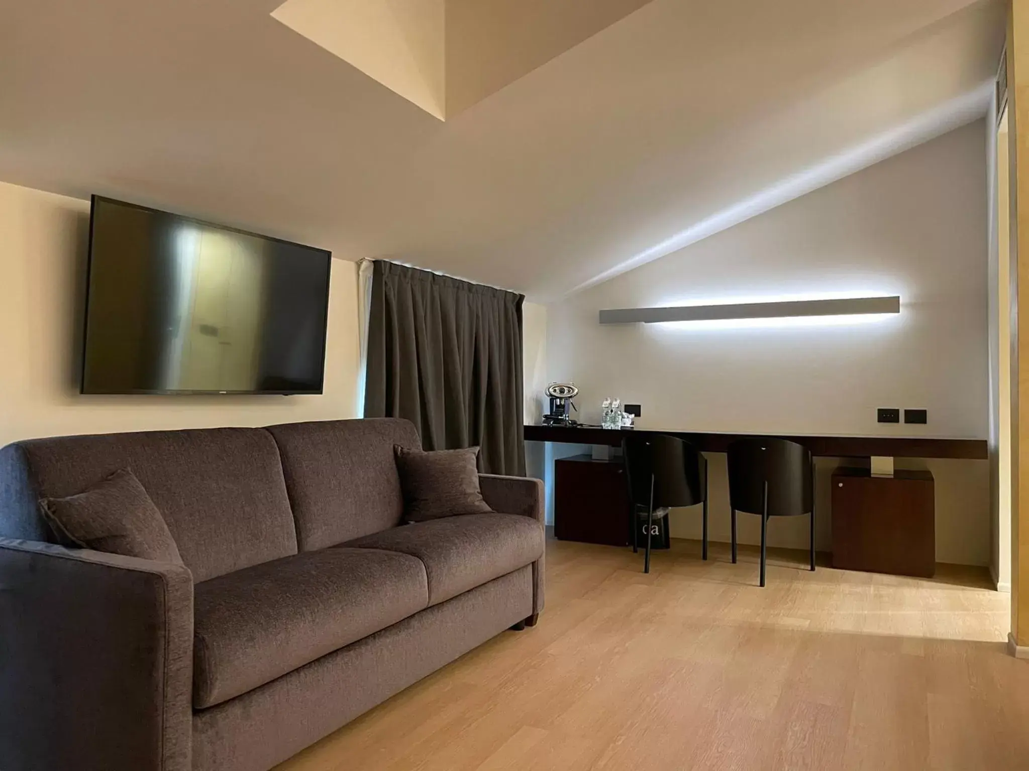 Living room, Seating Area in DelleArti Design Hotel