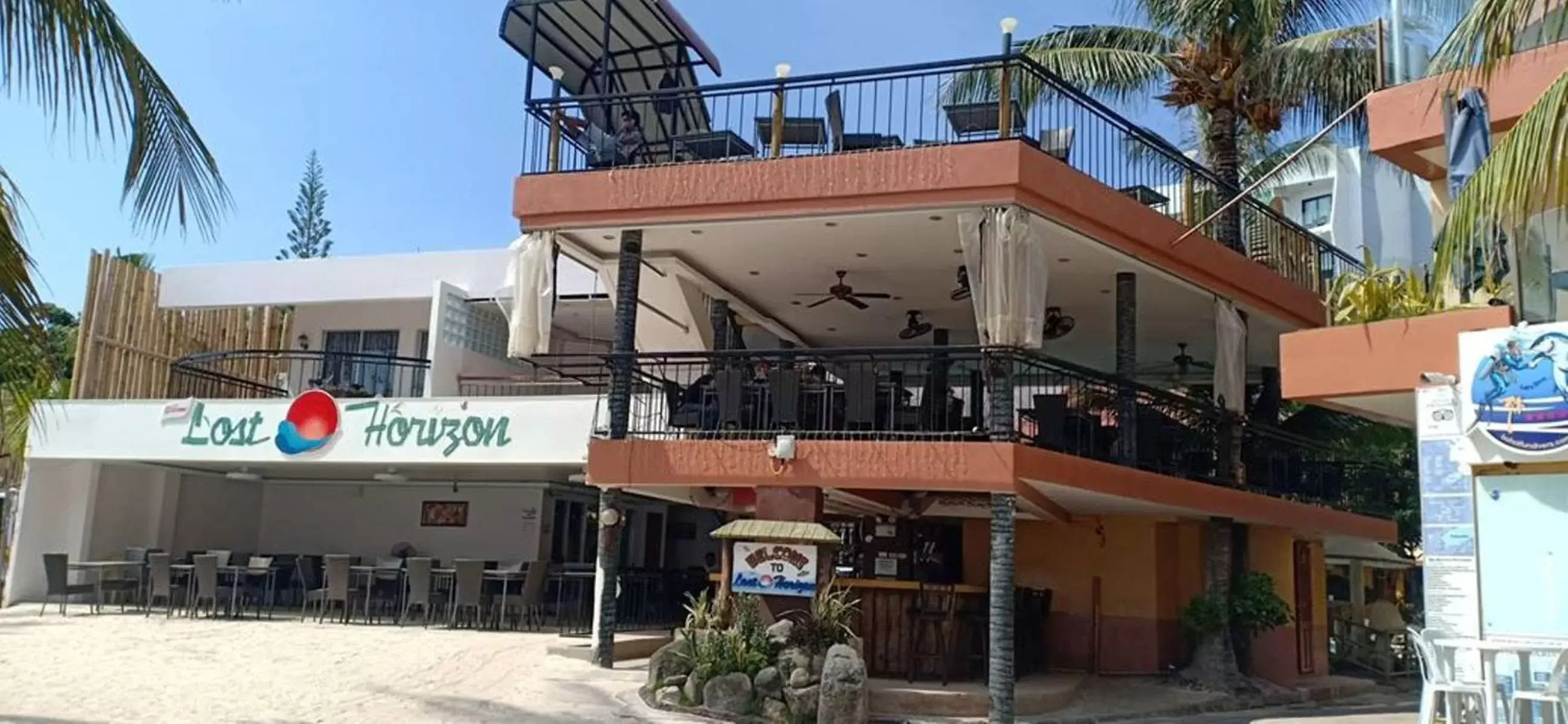 Facade/entrance, Property Building in Lost Horizon Beach Dive Resort