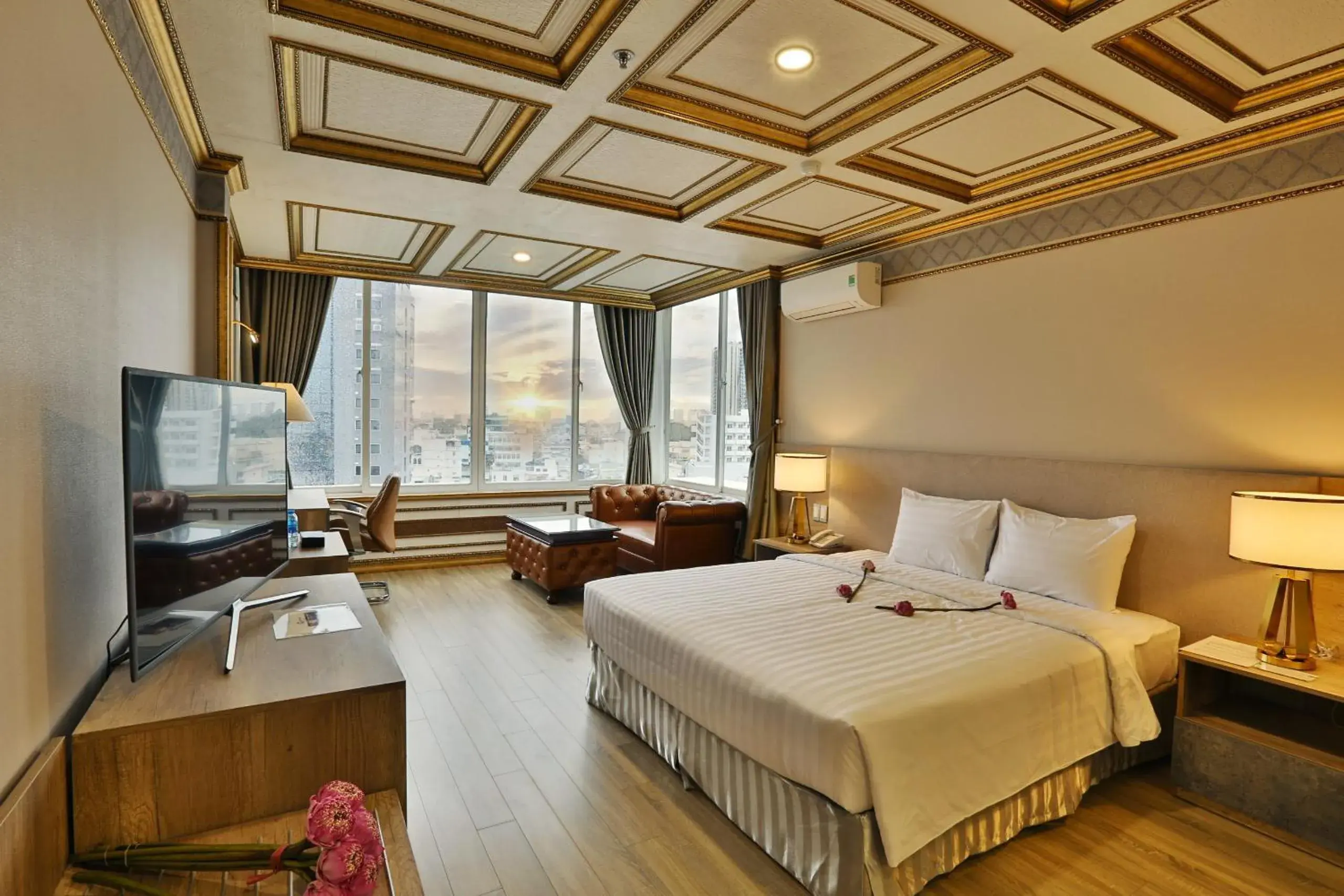 Living room, Bed in Lotus Saigon Hotel Living room, Bed in Lotus Saigon Hotel