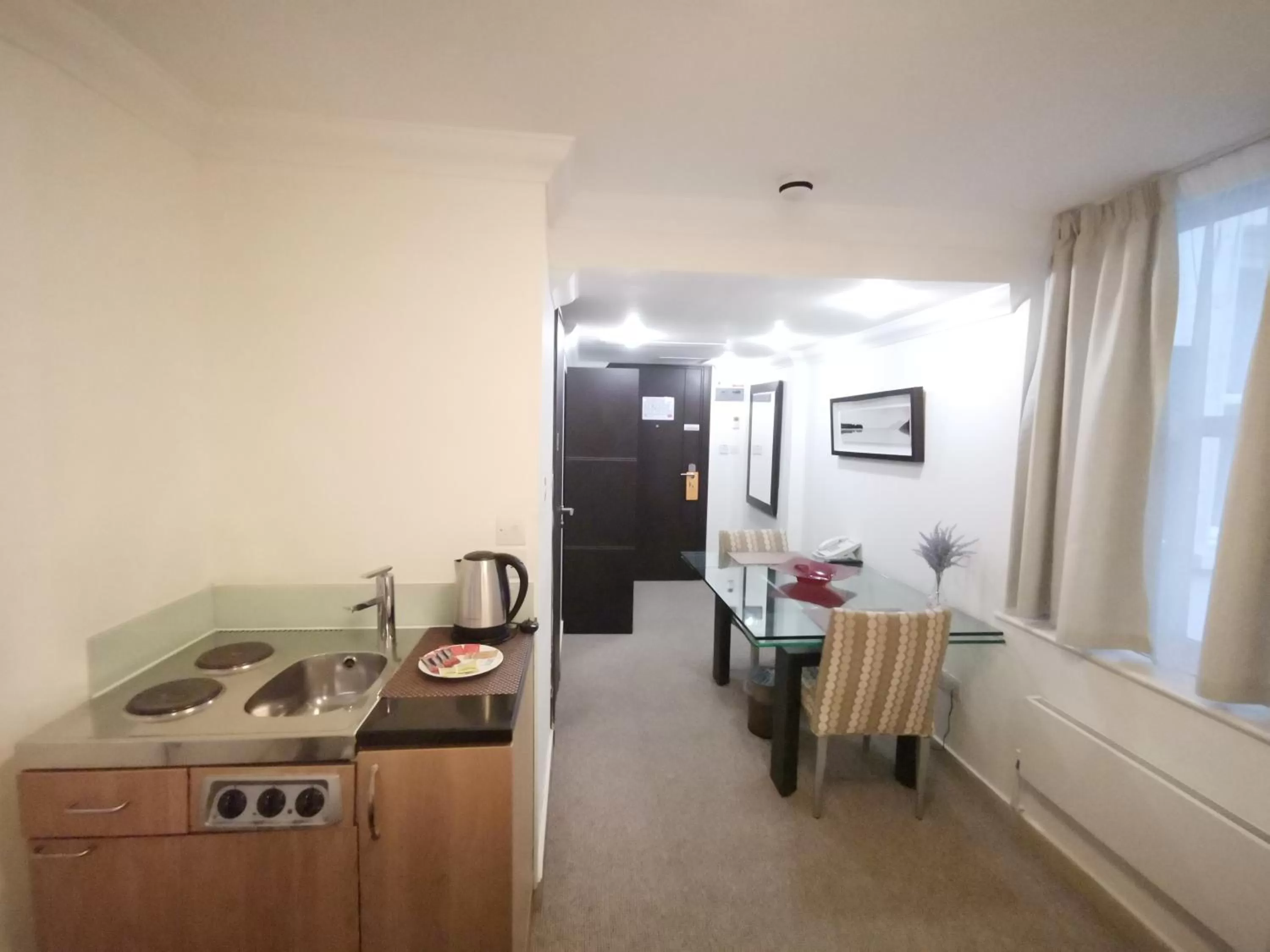 Kitchen or kitchenette in The Royale Chulan Hyde Park Hotel