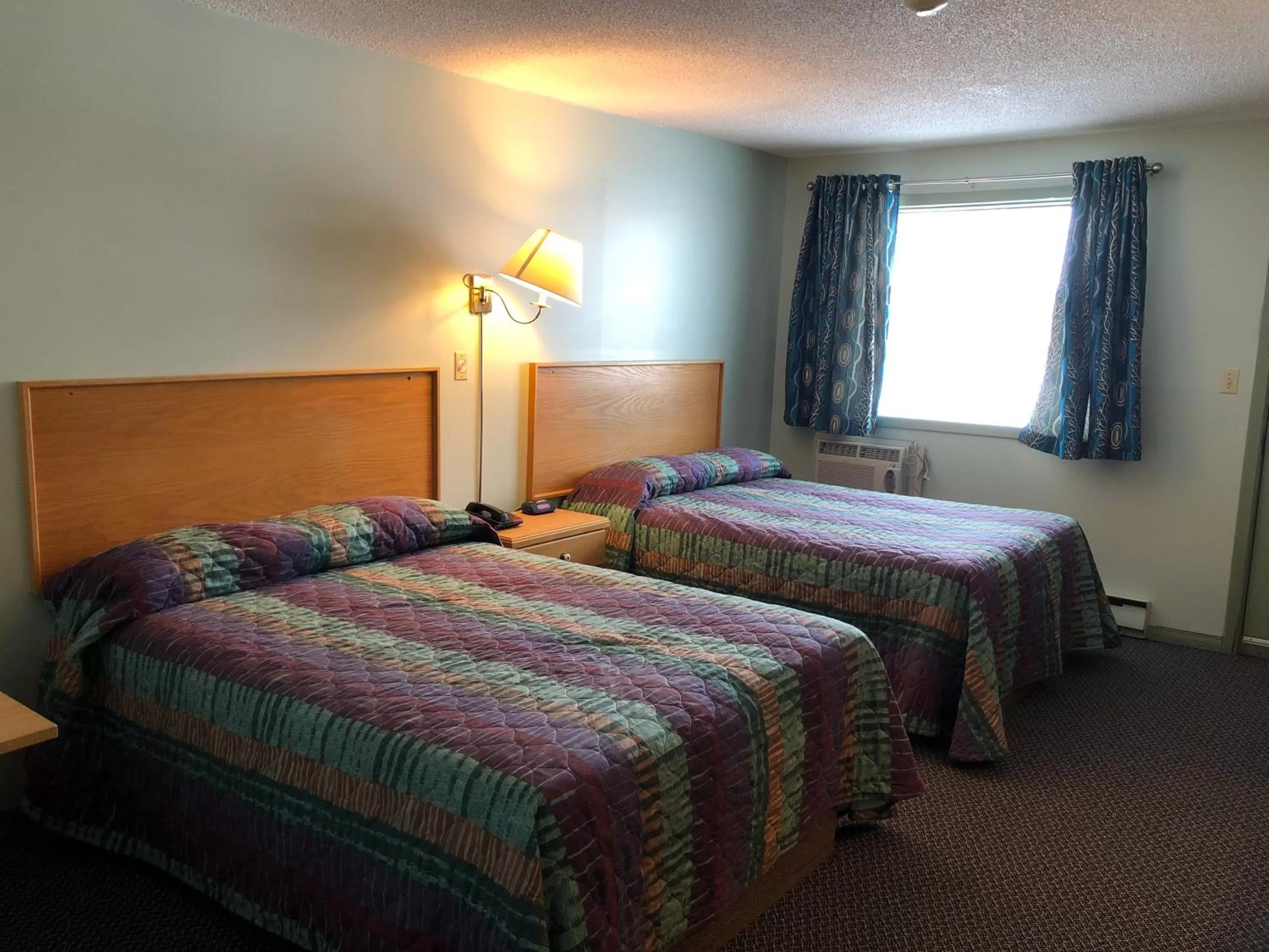 Bed in Chimo Motel