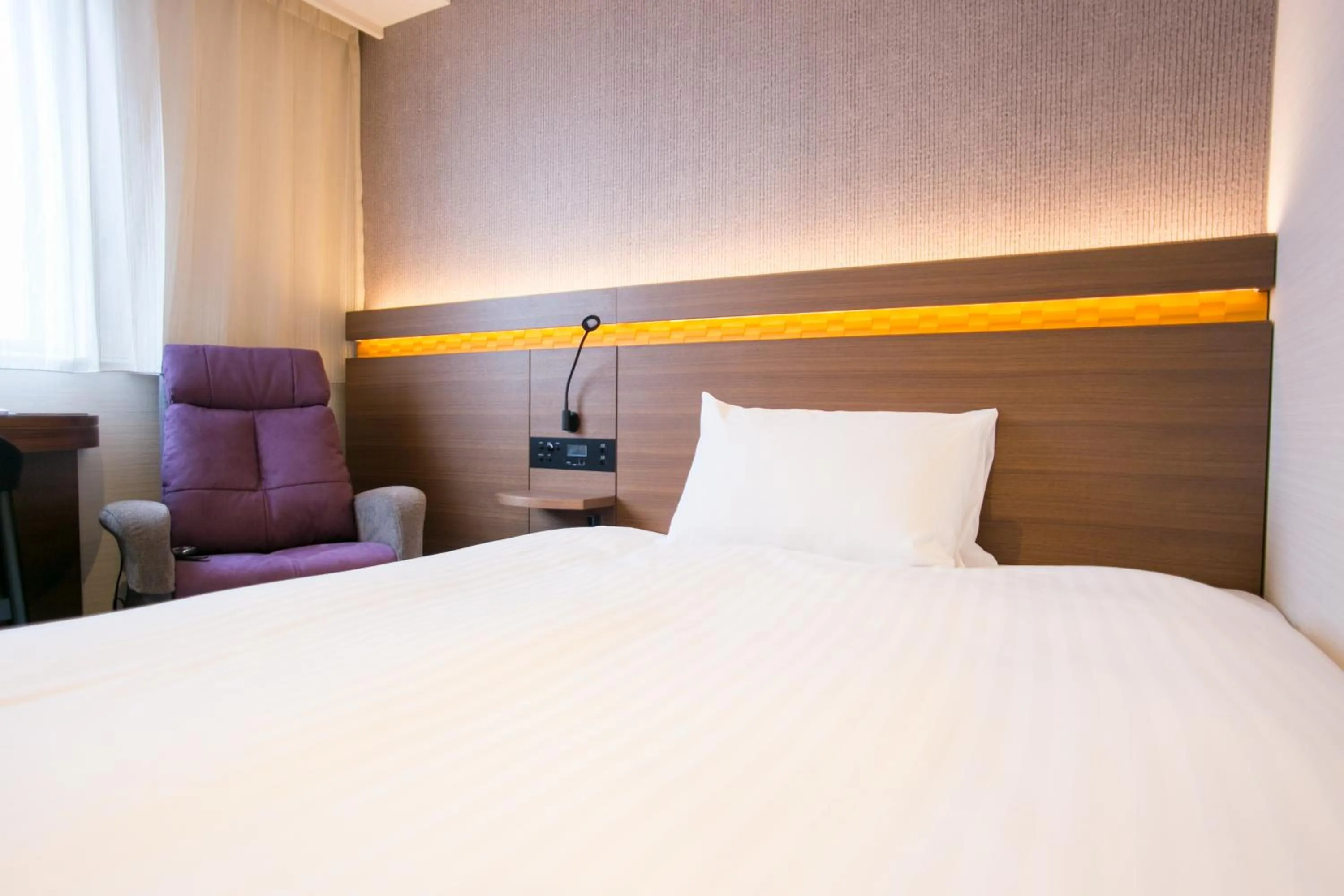 Bed in Nishitetsu Hotel Croom Hakata