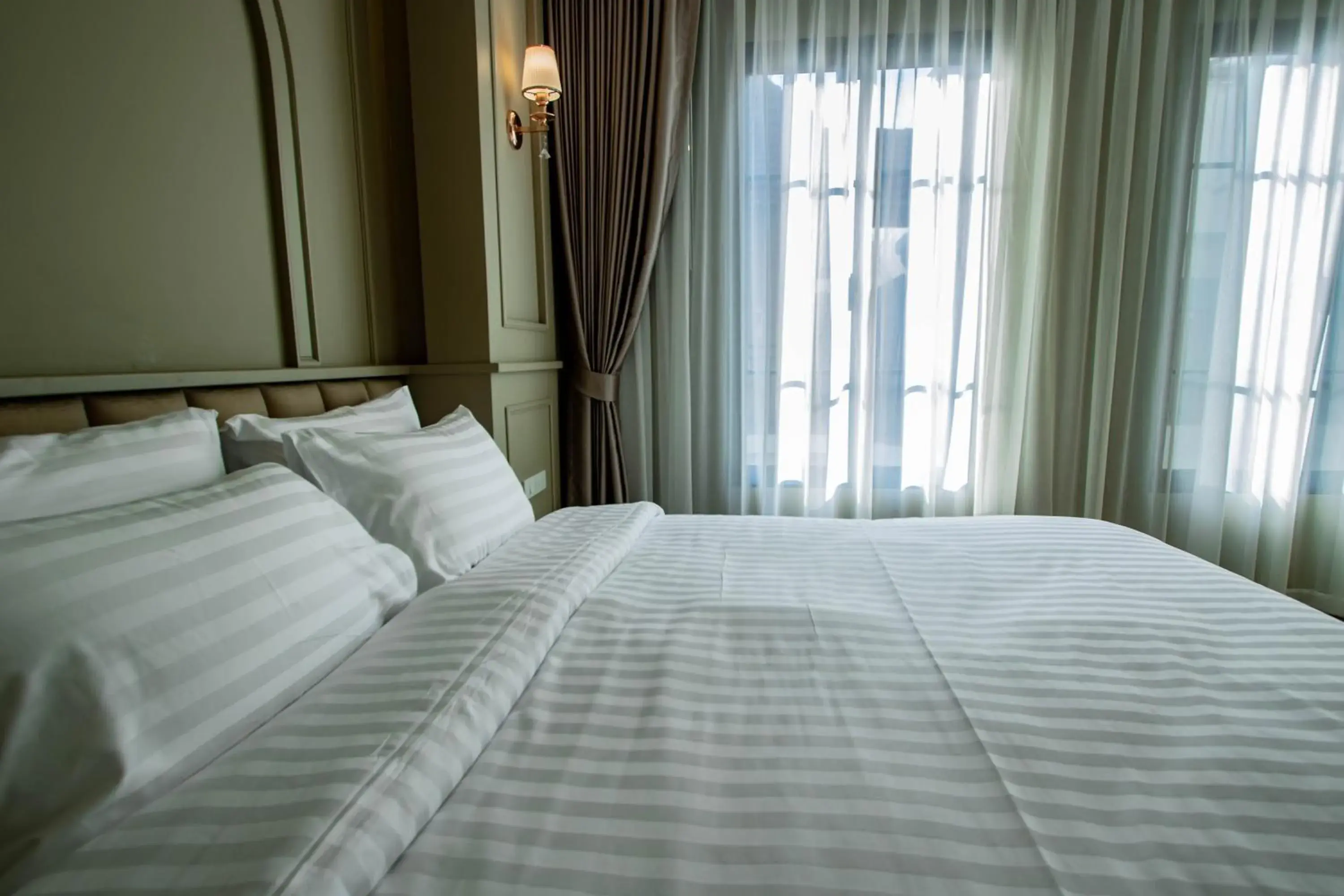 Bed in Eurana Boutique Hotel