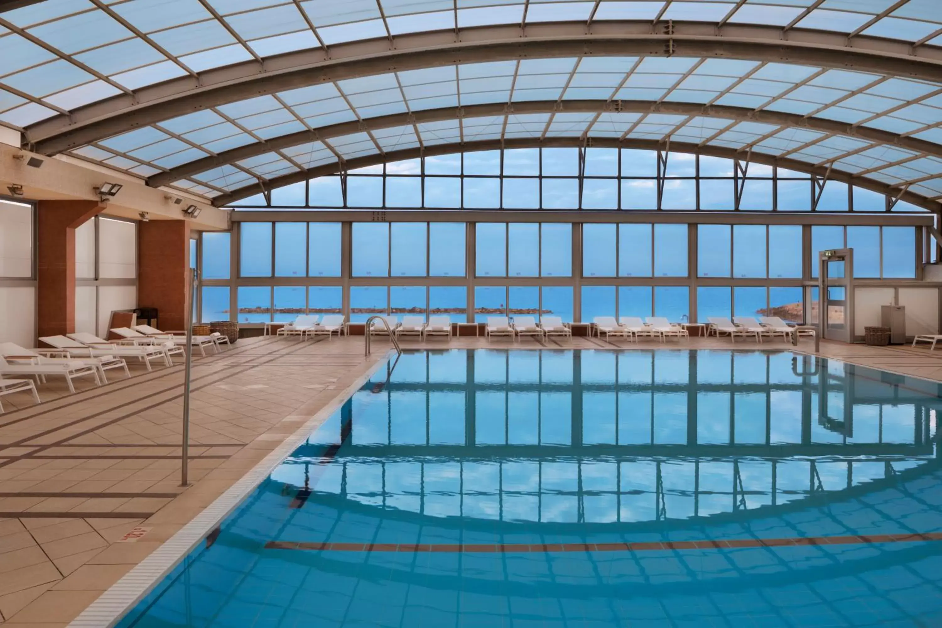 Swimming Pool in Crowne Plaza Tel Aviv Beach, an IHG Hotel