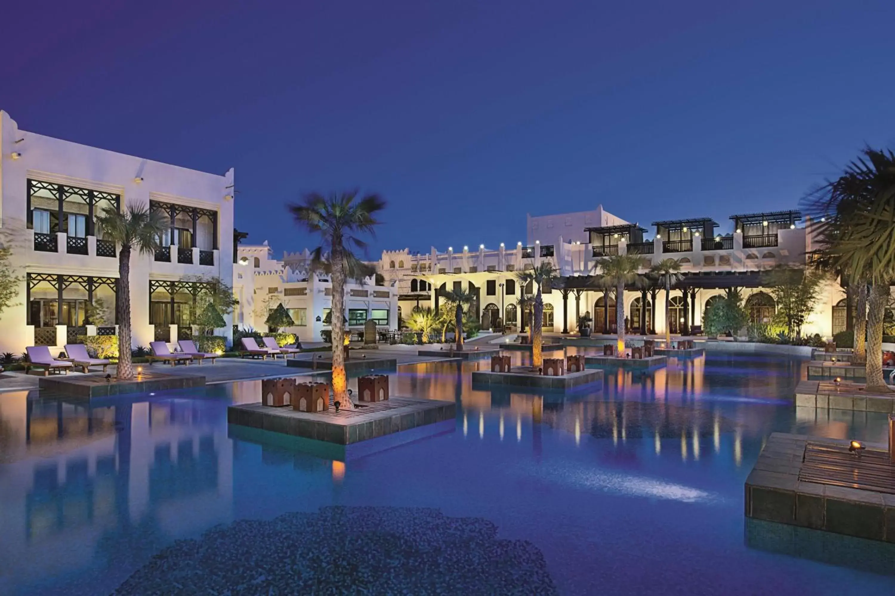 Property building, Swimming Pool in Sharq Village & Spa, a Ritz-Carlton Hotel