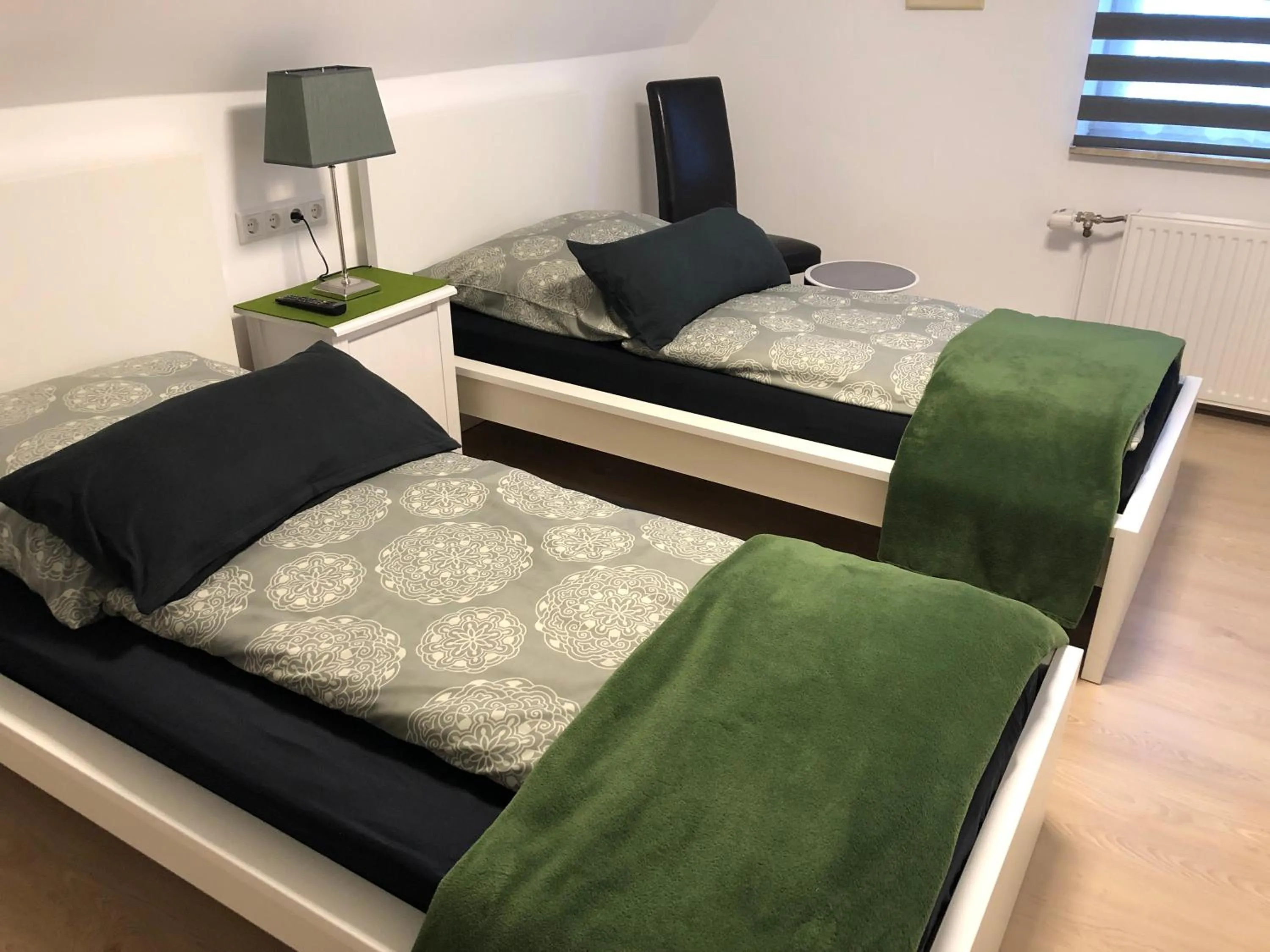 Photo of the whole room, Bed in Messezimmer 4u