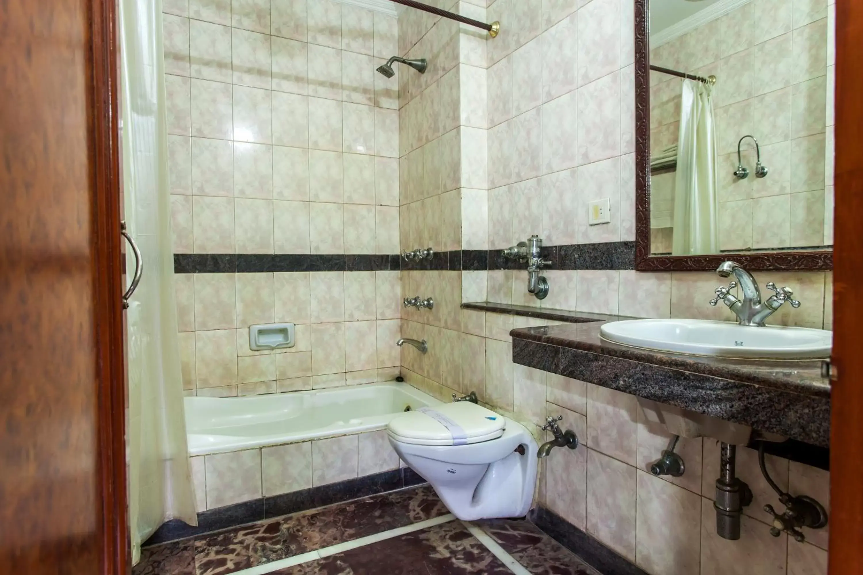 Bathroom in Hotel Sunstar Residency