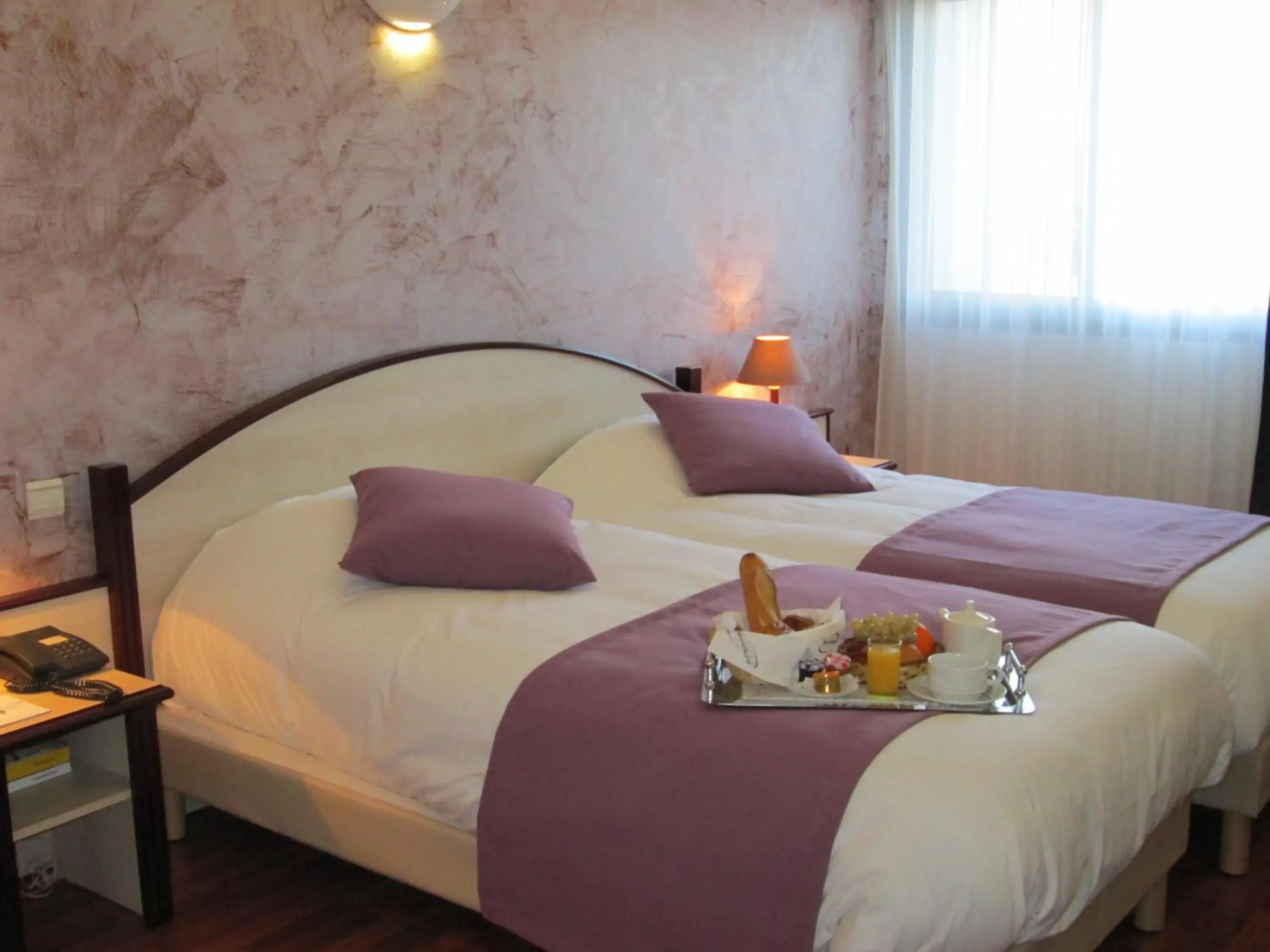 Bed in Hôtel Ariane