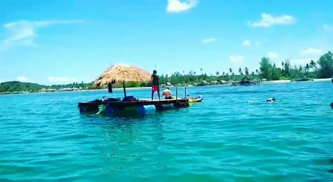 People in Madu Tiga Beach & Resort