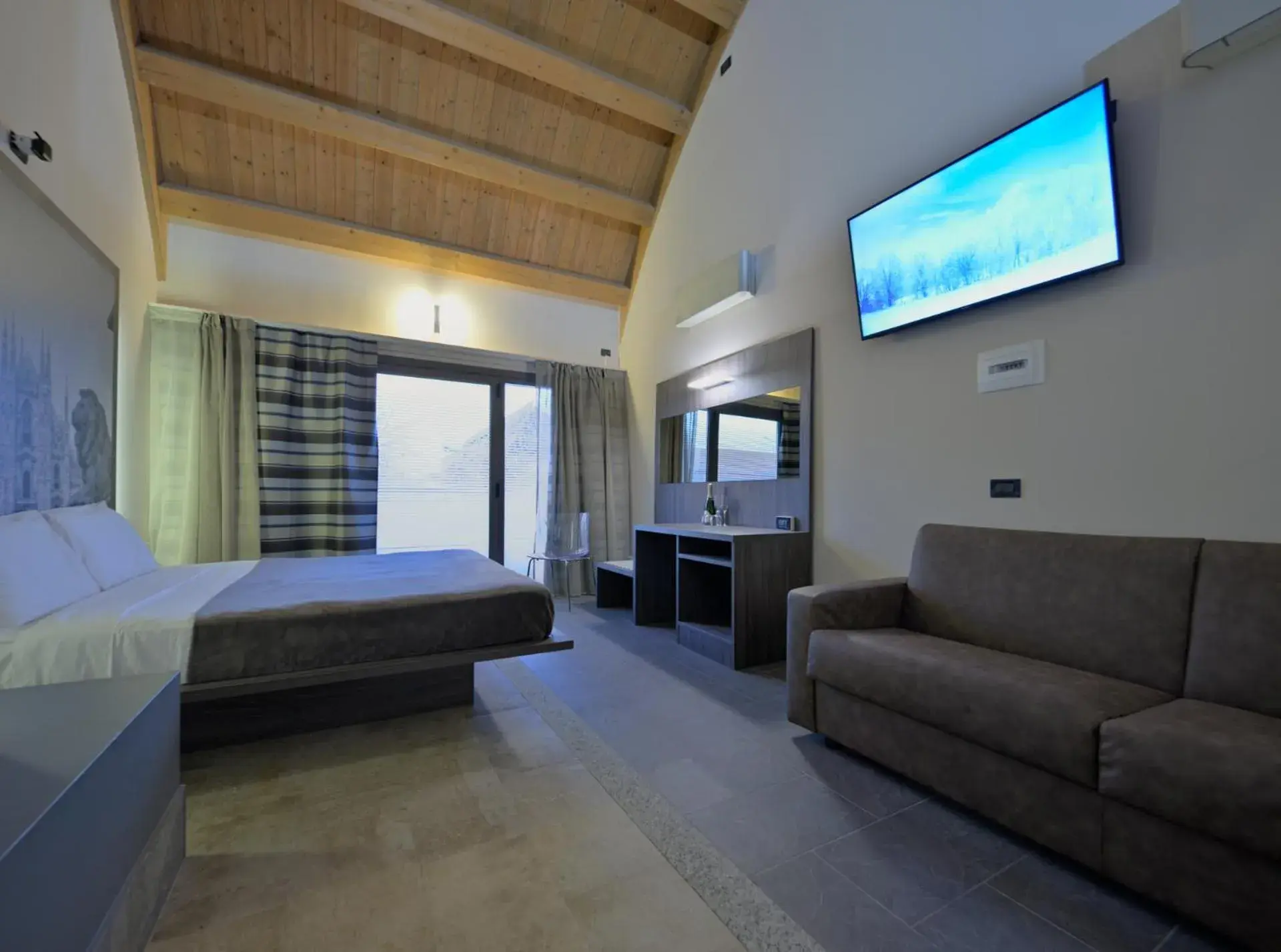 TV and multimedia, Seating Area in Hotel Seven Rooms