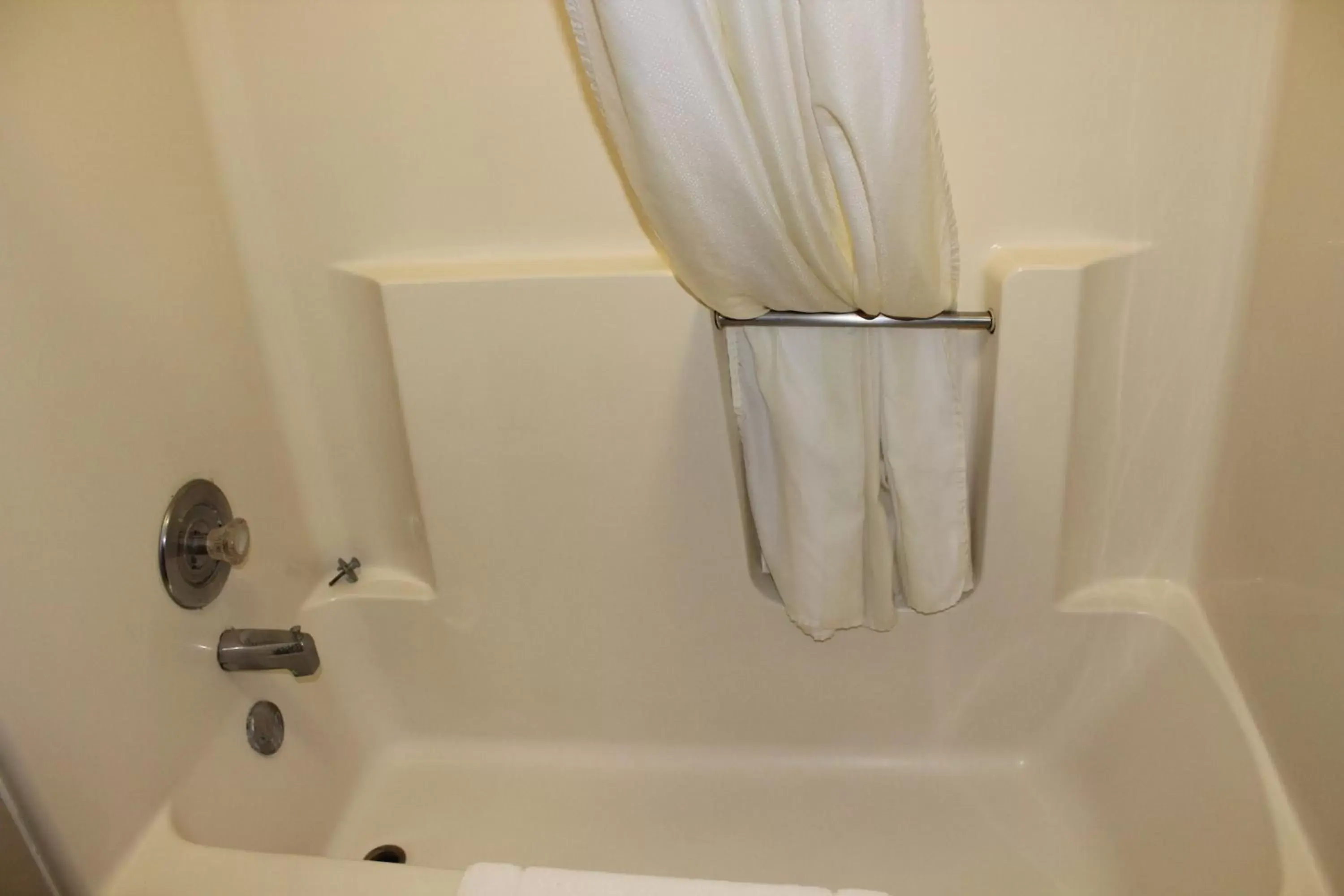Bathroom in Coratel Inn and Suites Maple Grove