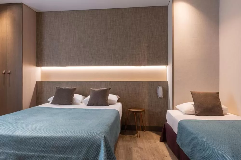 Bed in Central Hotel Paris