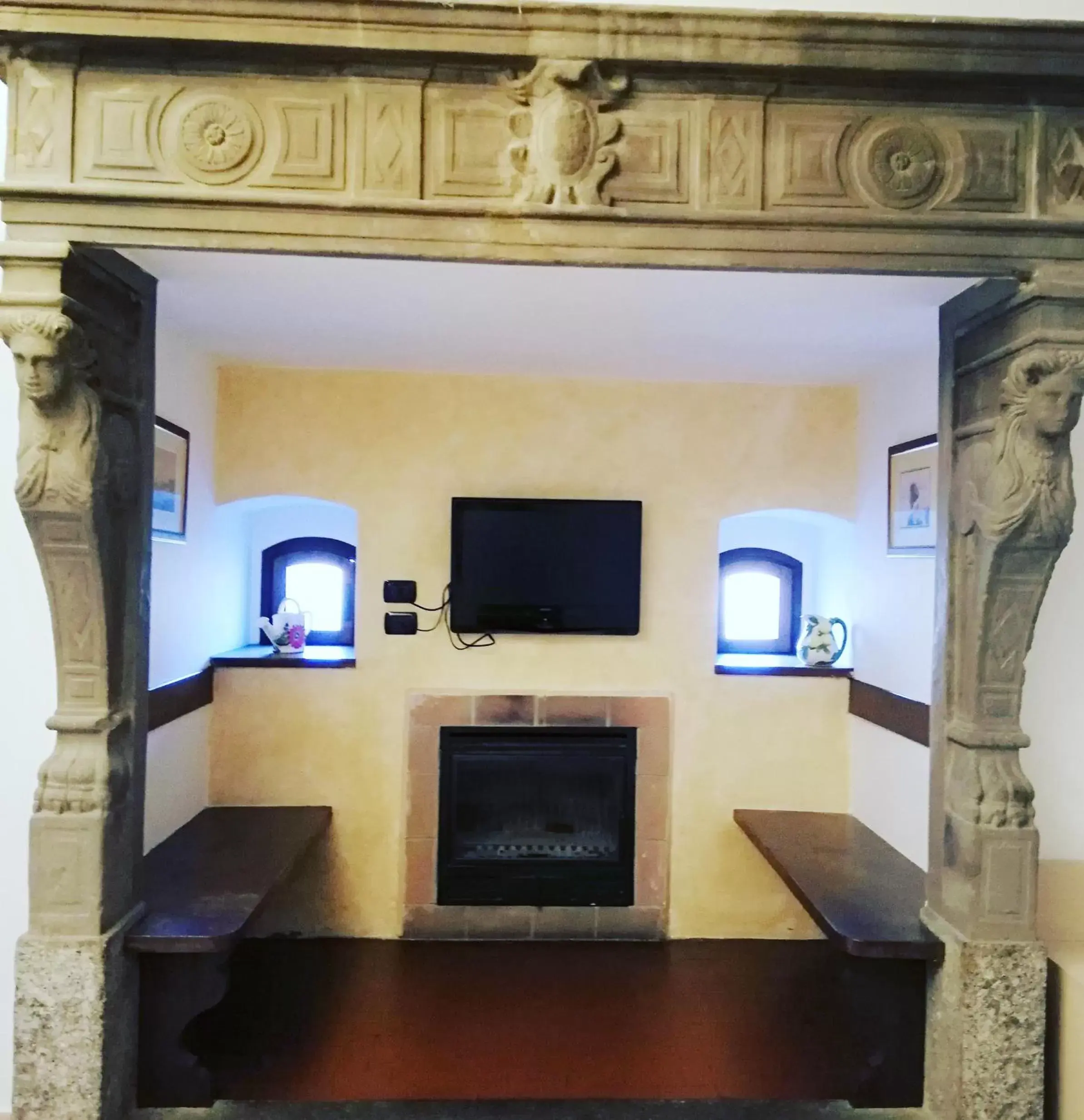 Decorative detail, TV/Entertainment Center in Hotel Fioroni