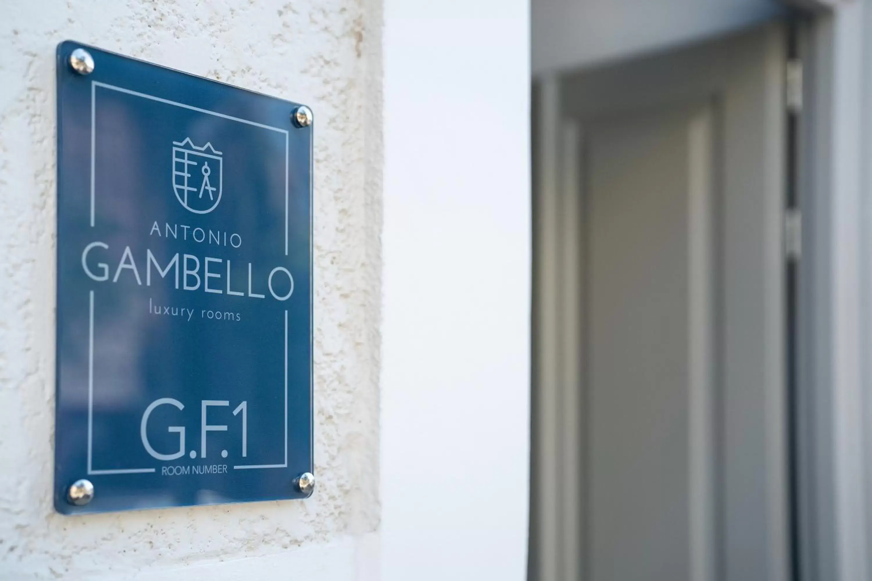 Logo/Certificate/Sign in Gambello Luxury Rooms