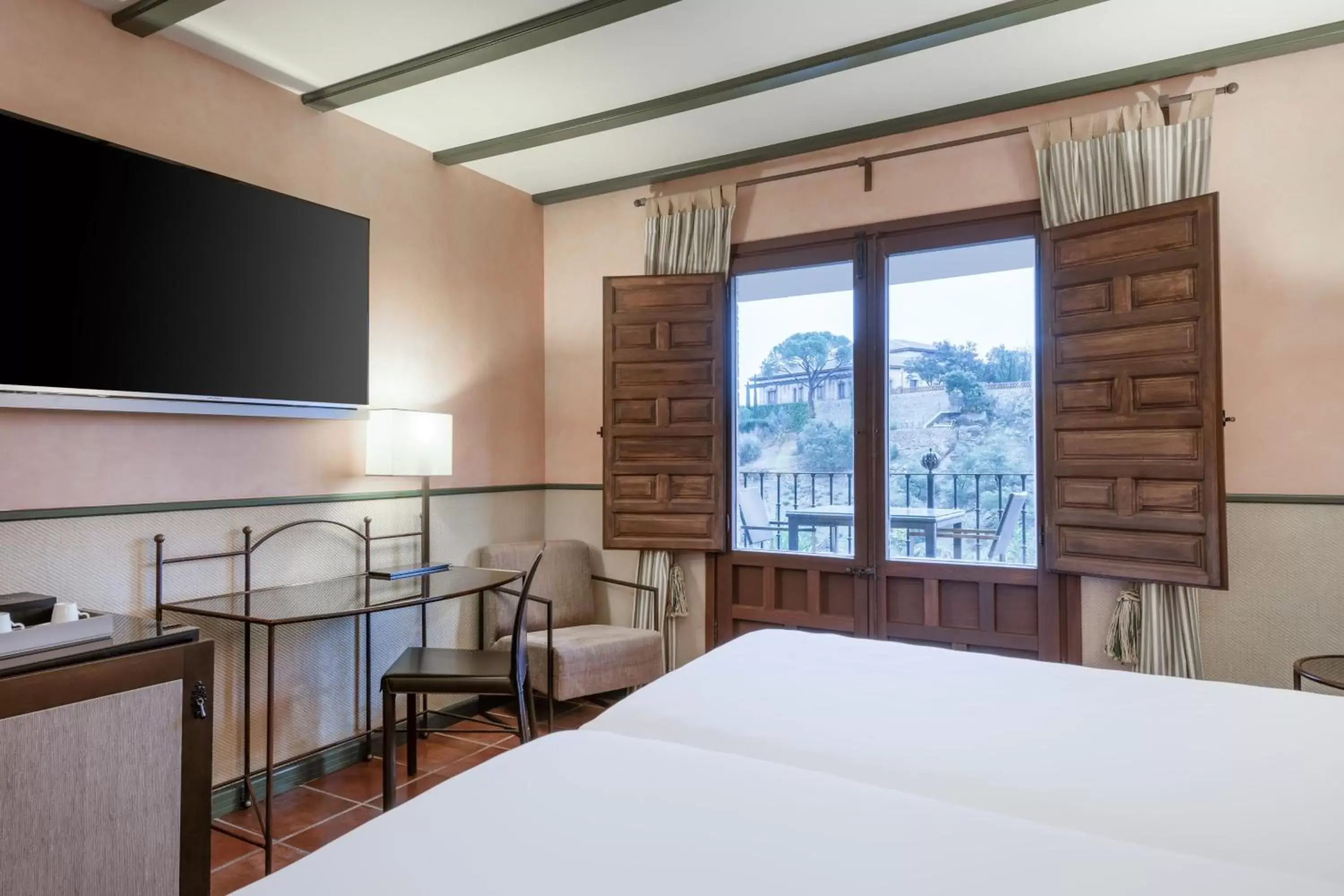Photo of the whole room, Bed in AC Hotel Ciudad de Toledo by Marriott