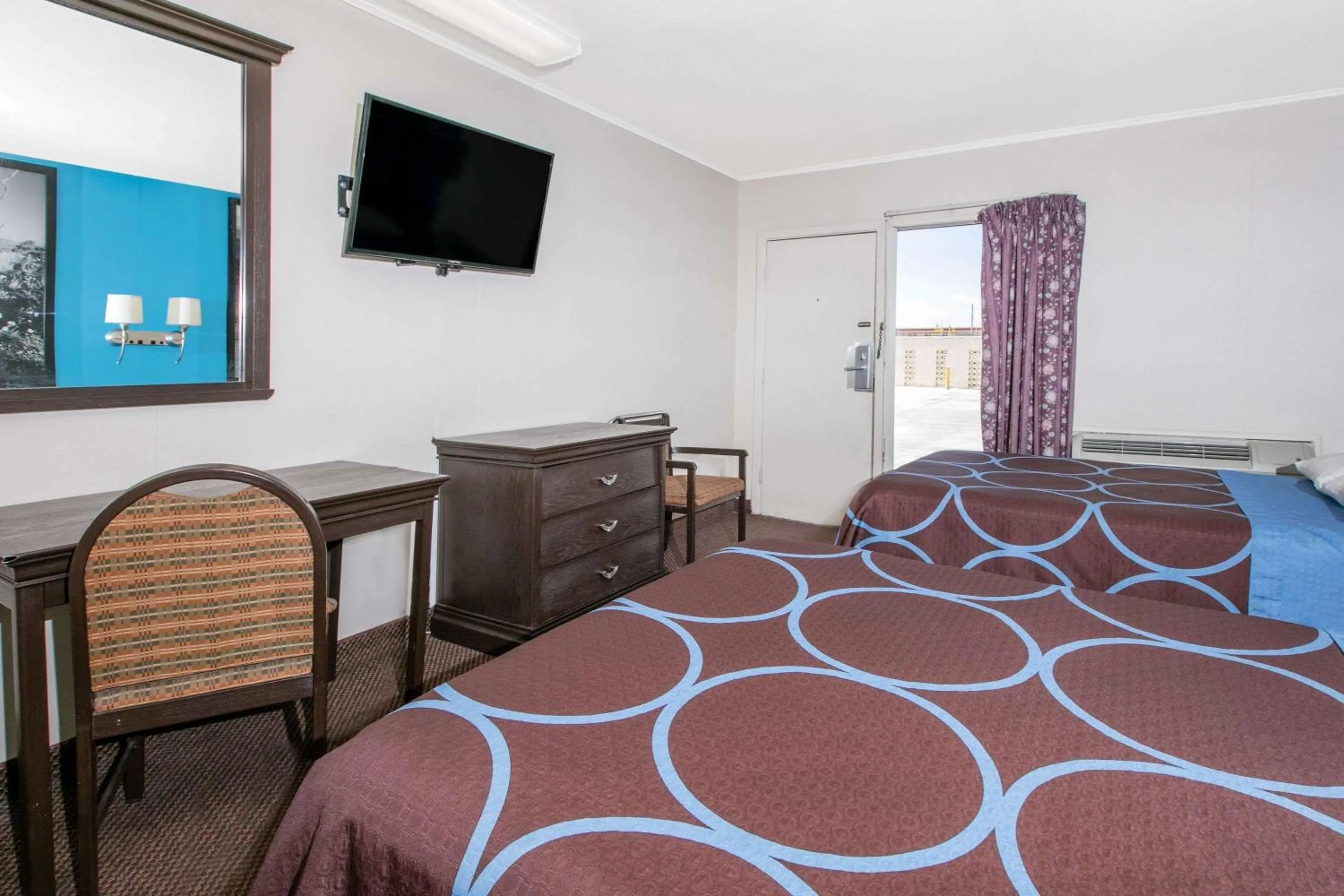 Photo of the whole room, Bed in Super 8 by Wyndham Lubbock Civic Center North