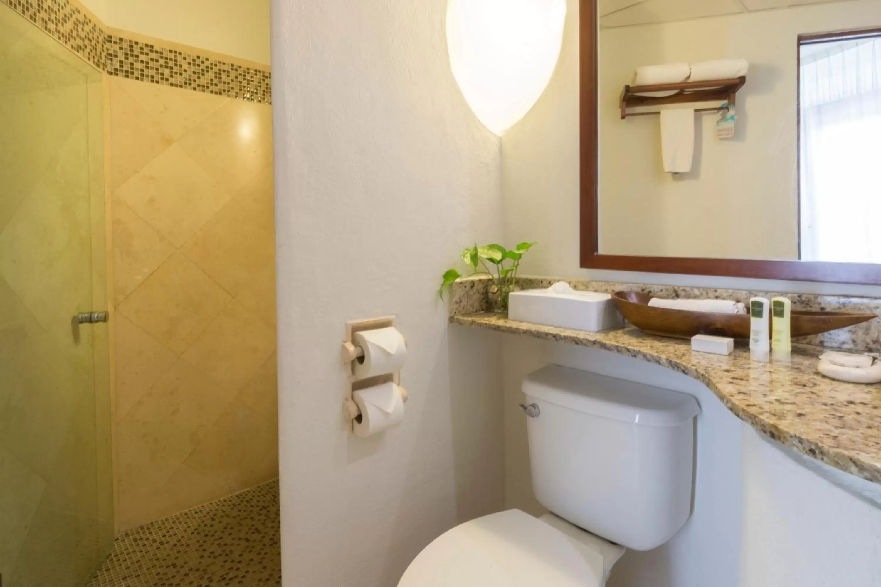 Bathroom in Playa Palms Beach Hotel