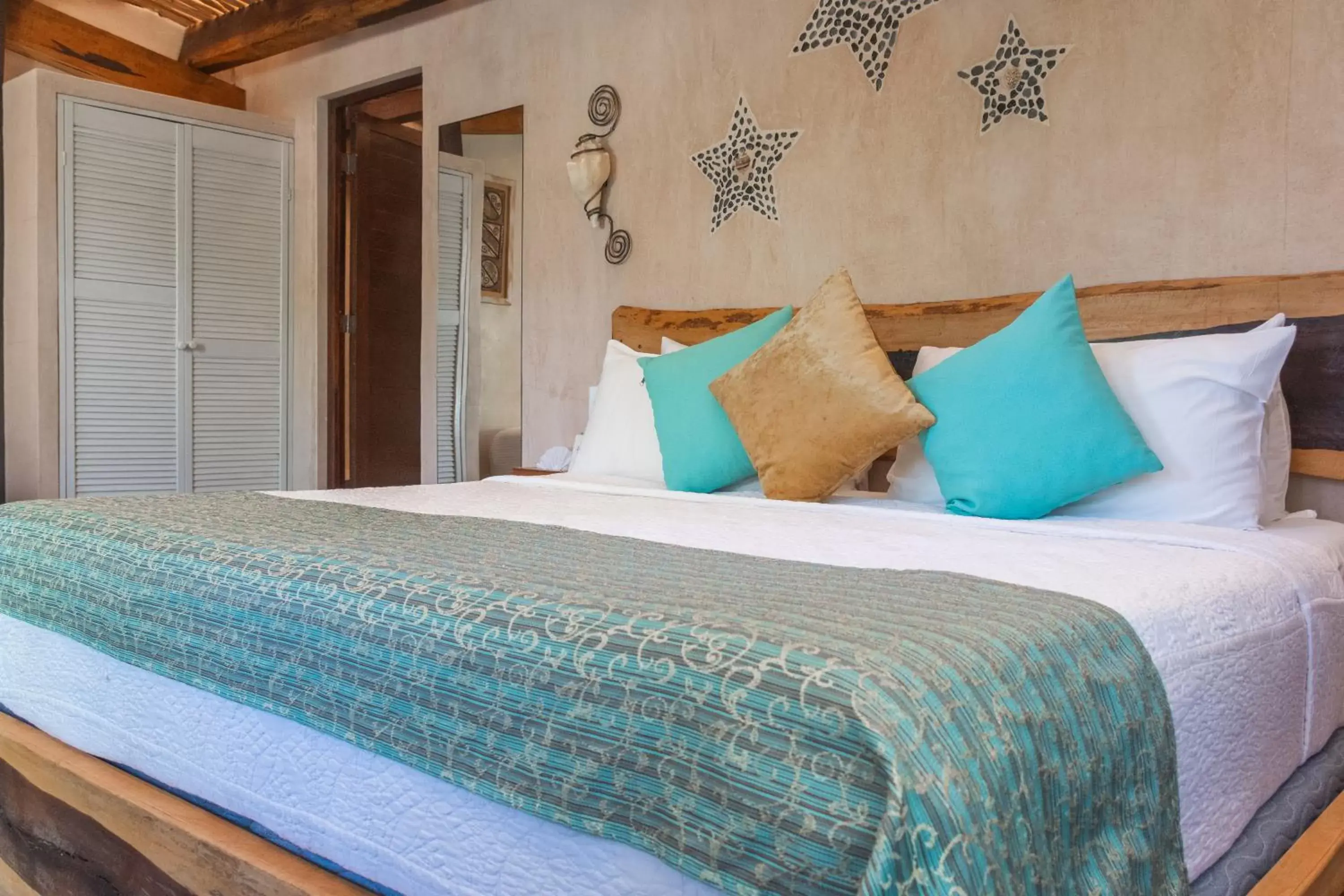 Bed in Villa Las Estrellas Tulum - located at the party zone