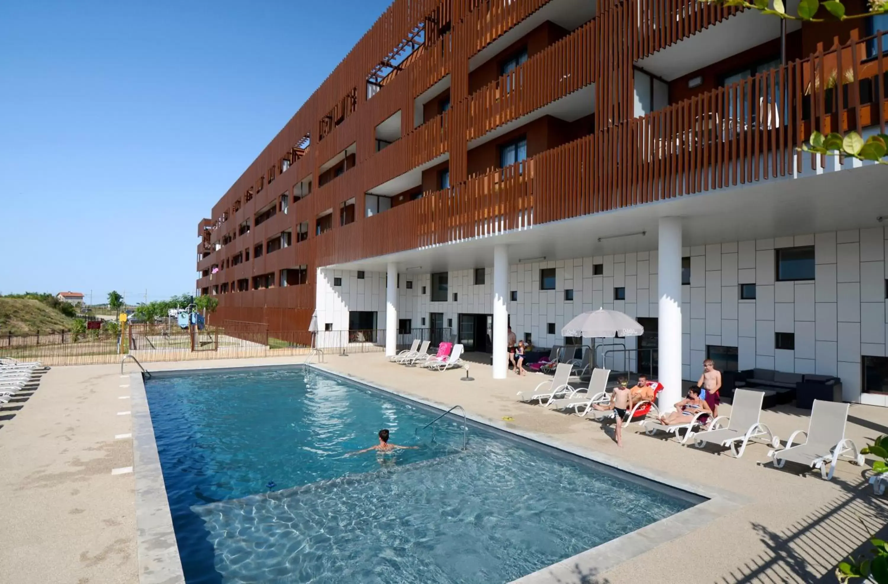 Swimming pool, Property Building in Résidence Odalys Terra Gaia