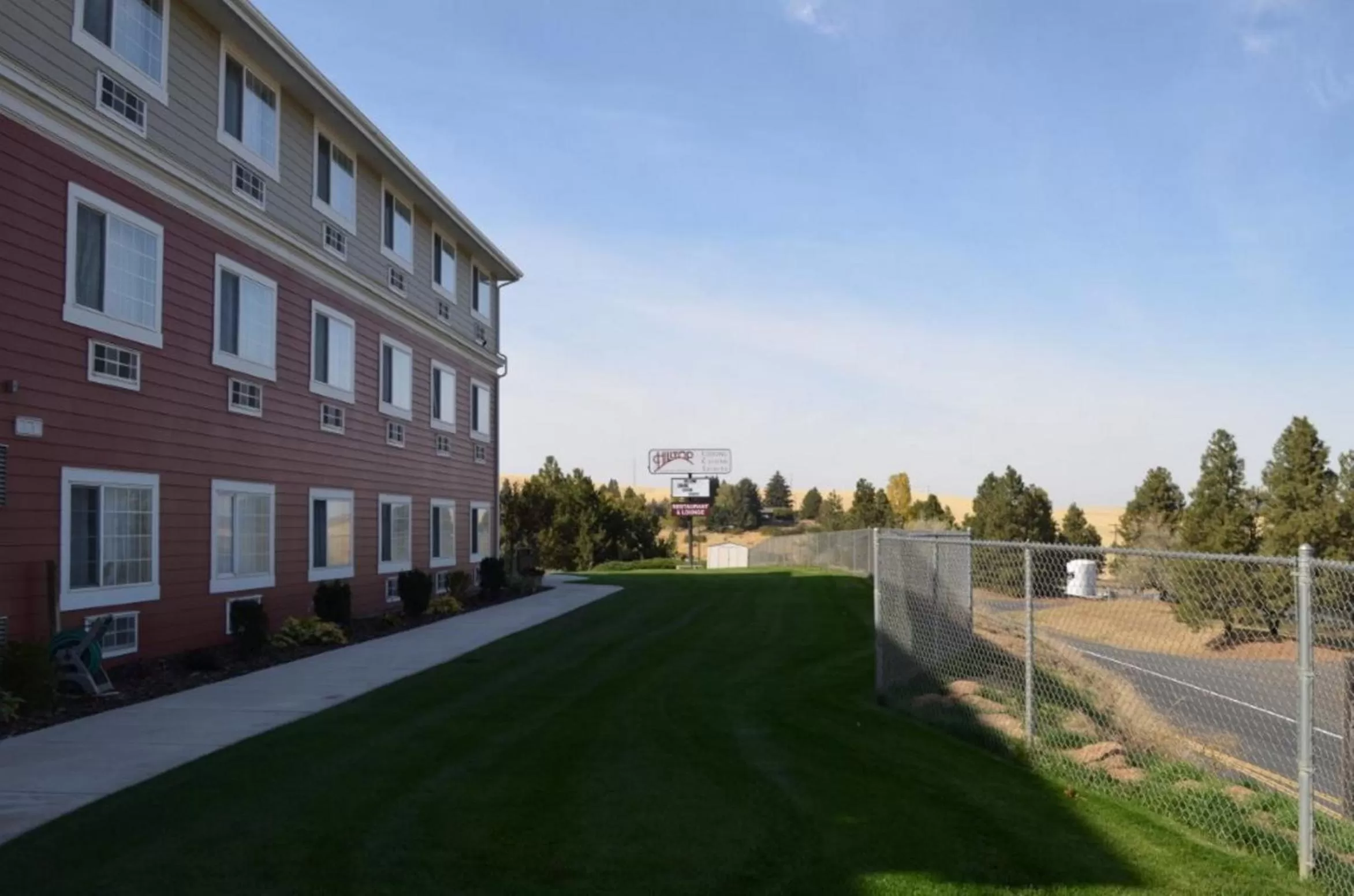 Property logo or sign in Coast Hilltop Inn