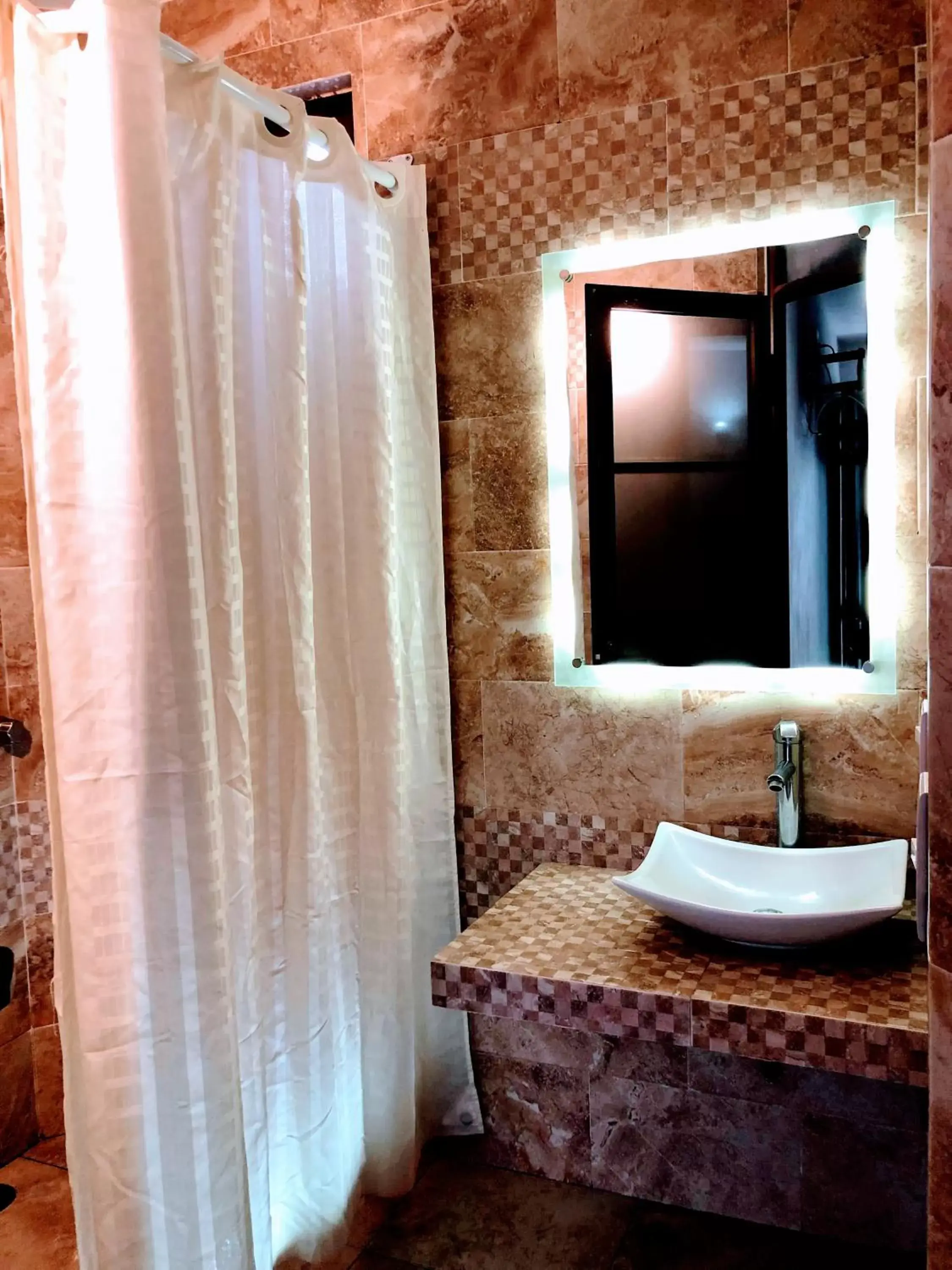 Bathroom in HOTEL LA GRAN MANZANA