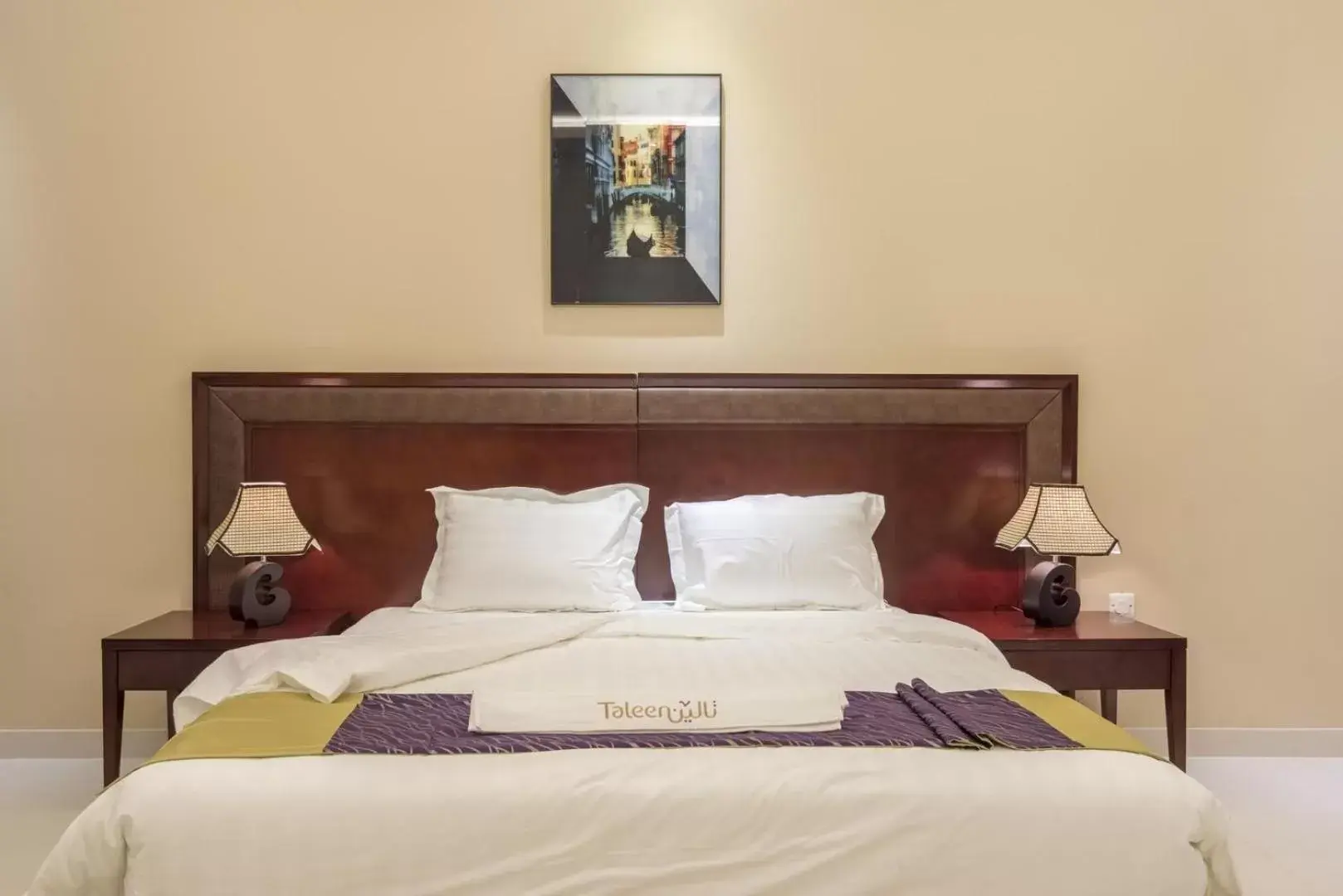 Bed in Taleen Al Nakheel Apartment