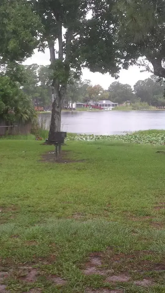 Lake view, Garden in Budget Inn Sanford International Airport