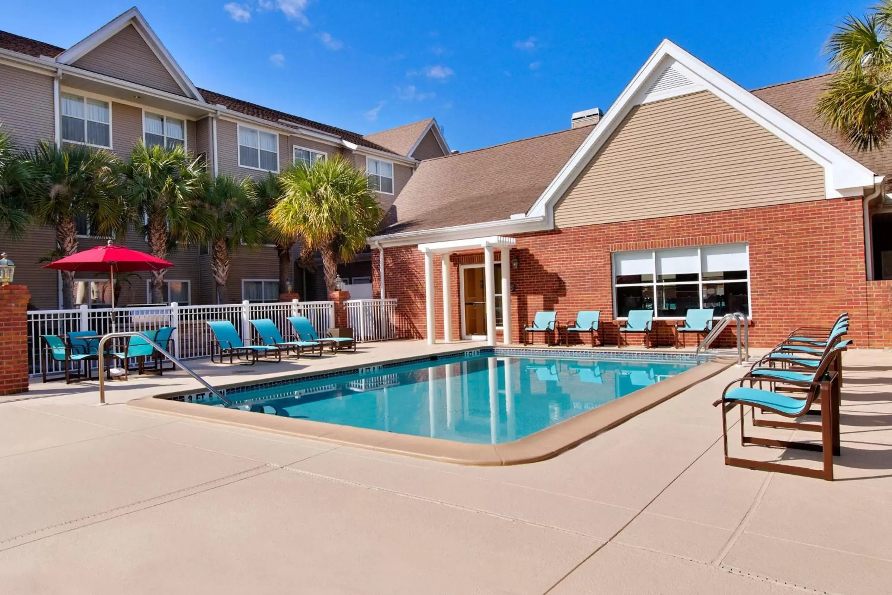 Swimming pool, Property Building in Residence Inn by Marriott Tampa at USF/Medical Center