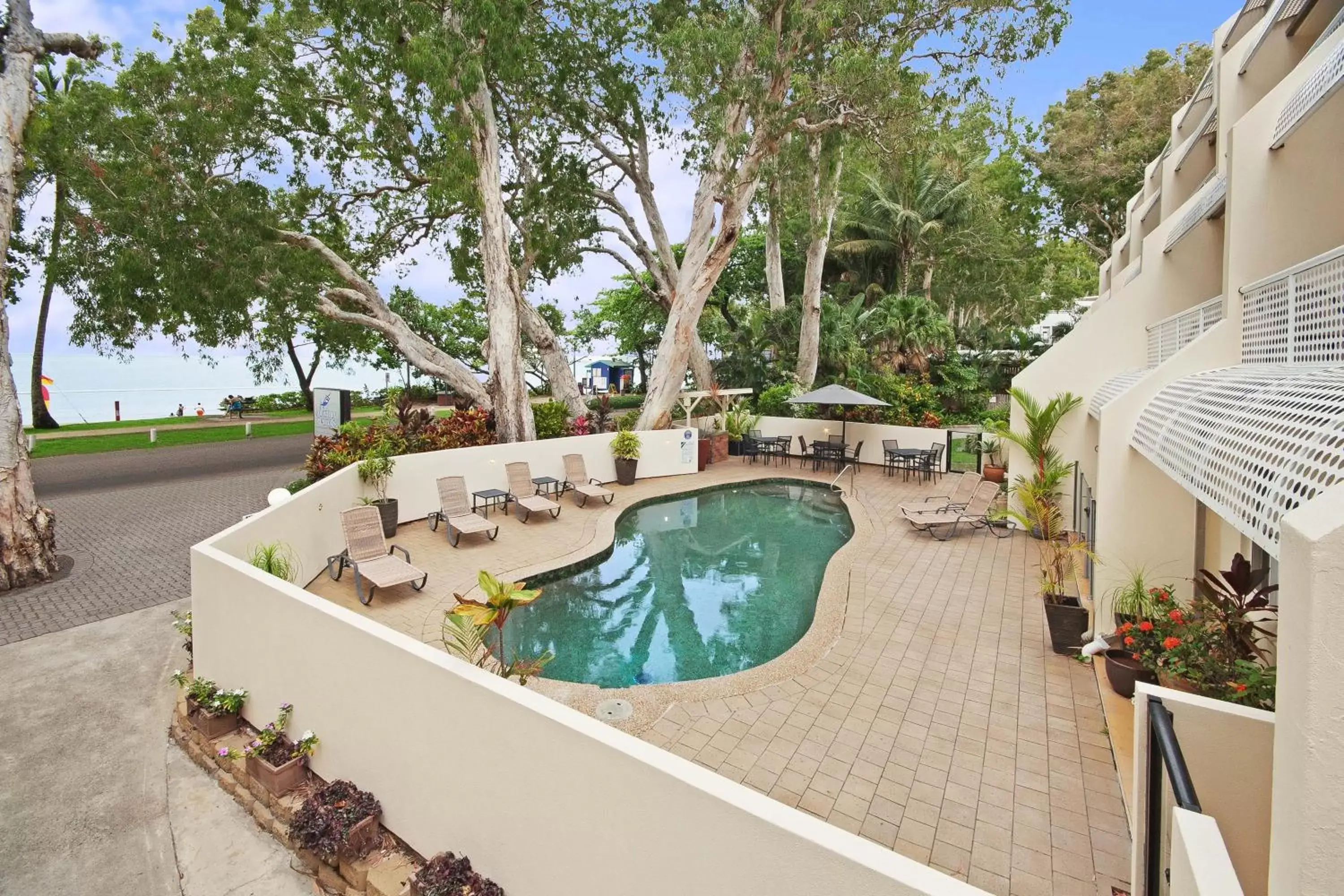 Swimming pool, Balcony/Terrace in Marlin Waters Beachfront Apartments