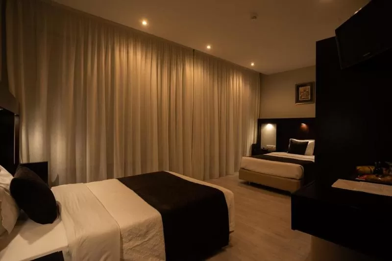 Bed in Pao de Acucar Hotel