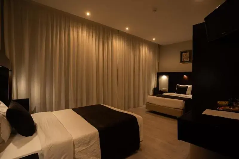 Bed in Pao de Acucar Hotel Bed in Pao de Acucar Hotel