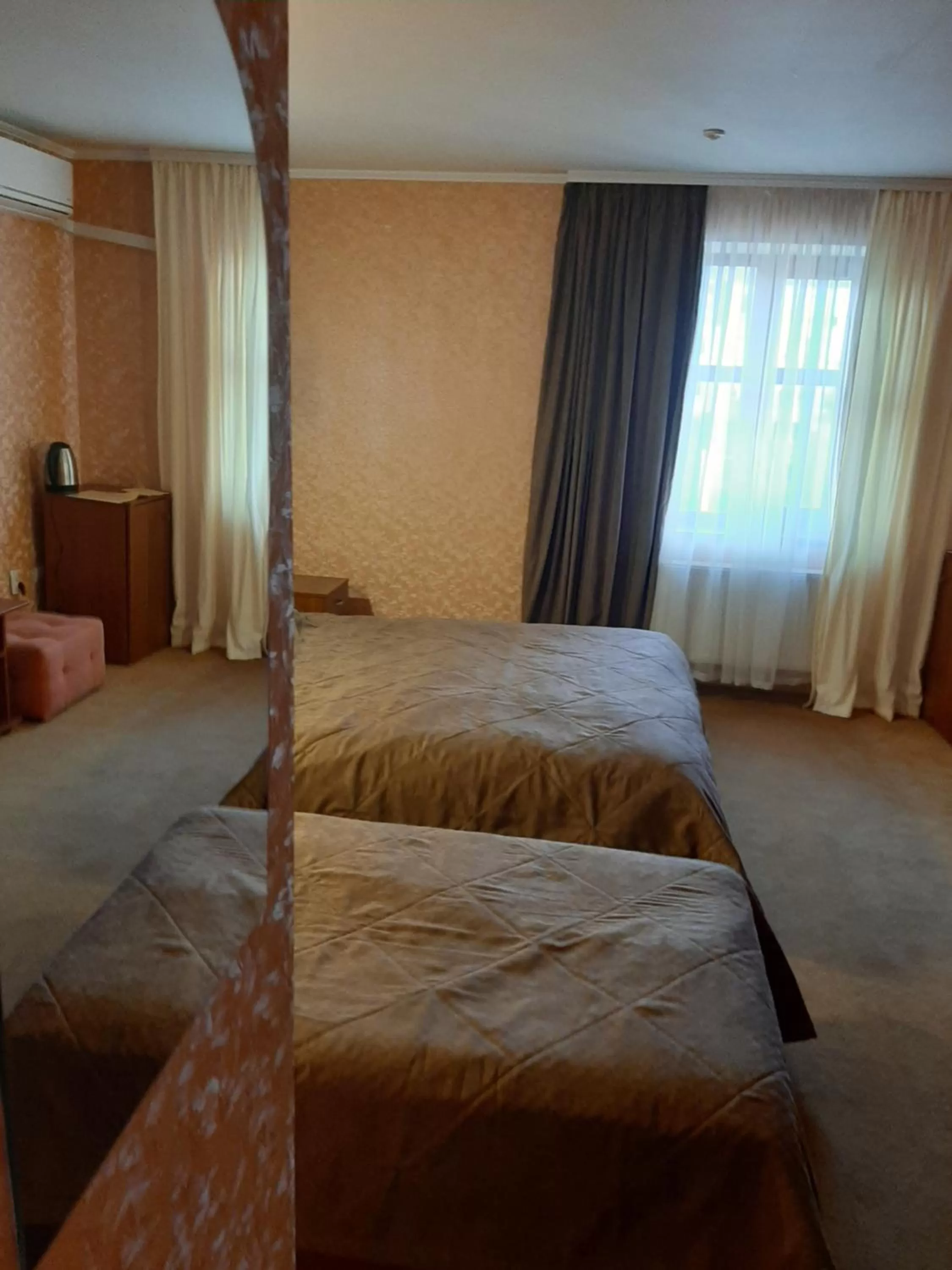Bed in Stara Vezha Hotel