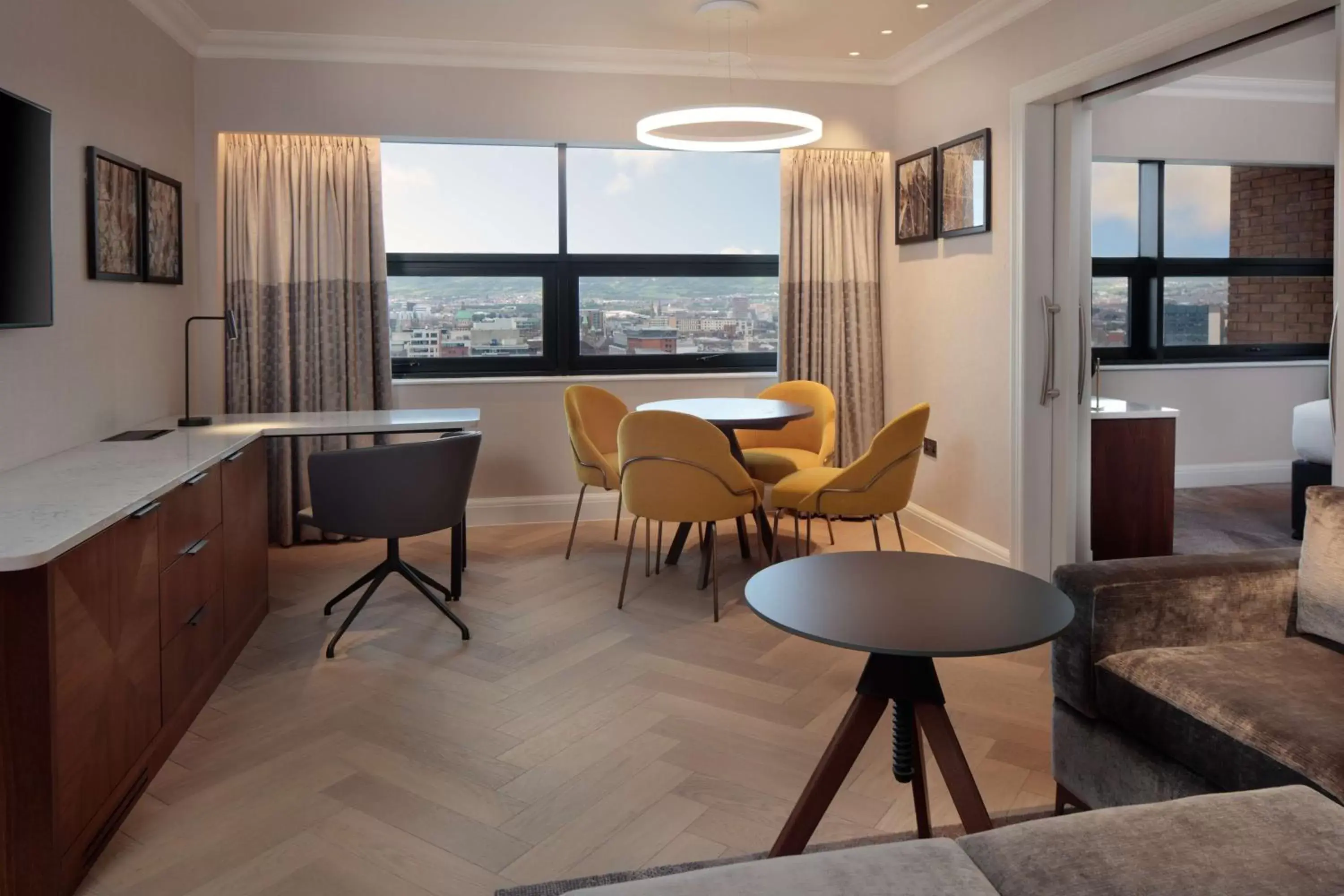 Living room, Dining Area in Hilton Belfast