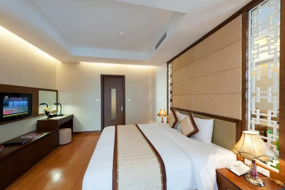 Bed in Muong Thanh Grand Xa La Hotel