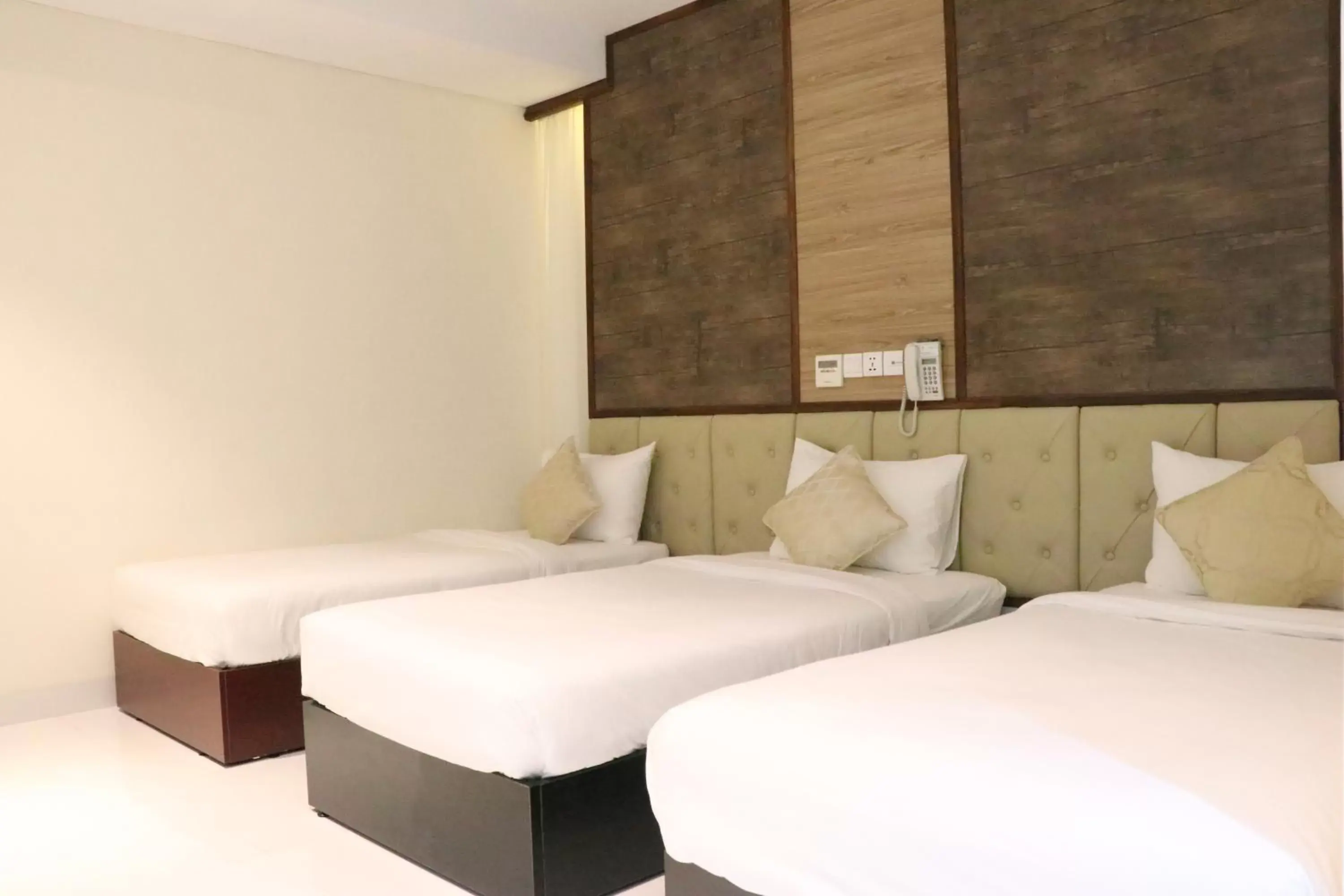 Bed in LCS Hotel & Apartment Bed in LCS Hotel & Apartment