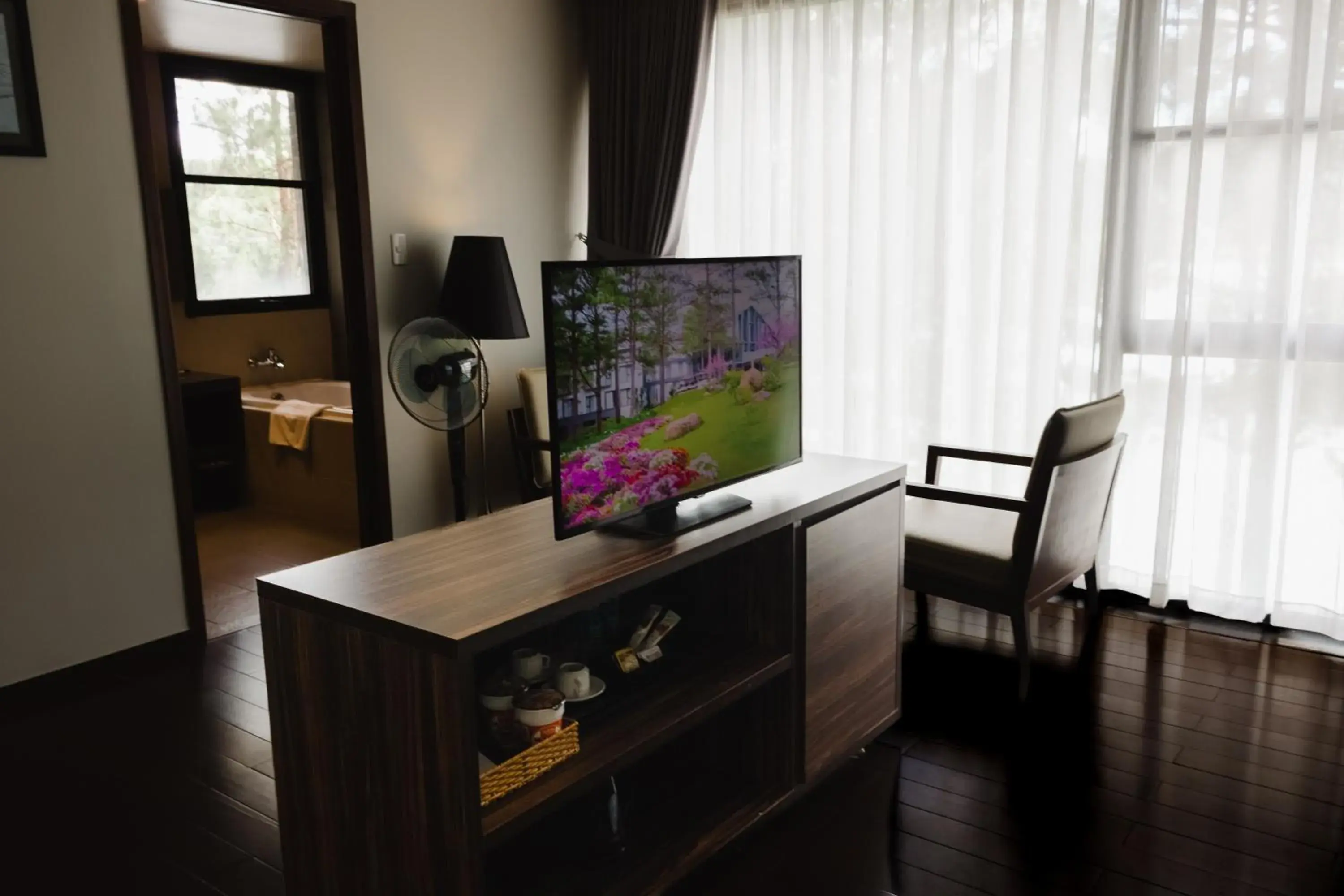 TV and multimedia, TV/Entertainment Center in Terracotta Hotel And Resort Dalat